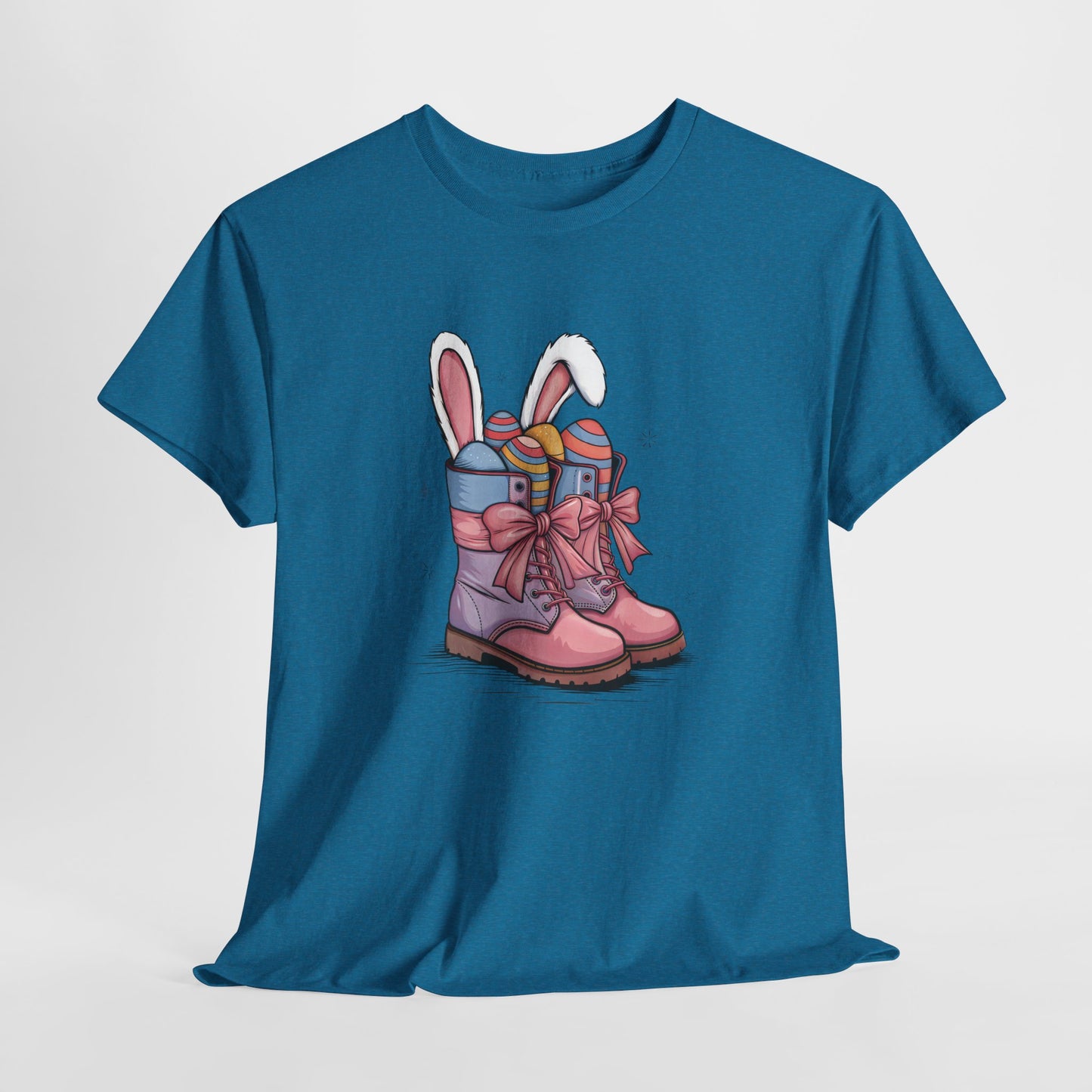 Antique Sapphire T-shirt hanging, featuring cowgirl boots filled with Easter eggs and bunny ears, a festive and stylish Easter design. Hop into the season in style and shop Easter shirts online today!
