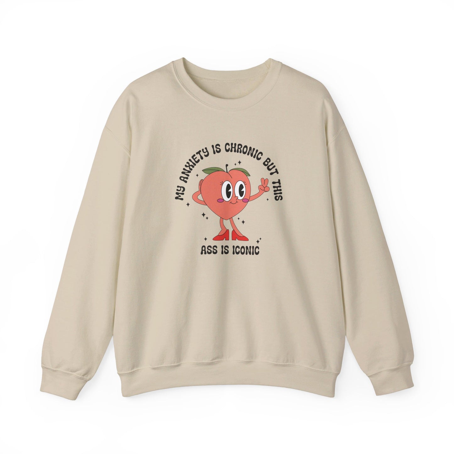 Front view of a beige sweater jumper with the text "My anxiety is chronic but this ass is iconic" and a cartoon peach illustration. Part of the Vivid Divergence Sensory Friendly Unisex Sweater Jumper Range.