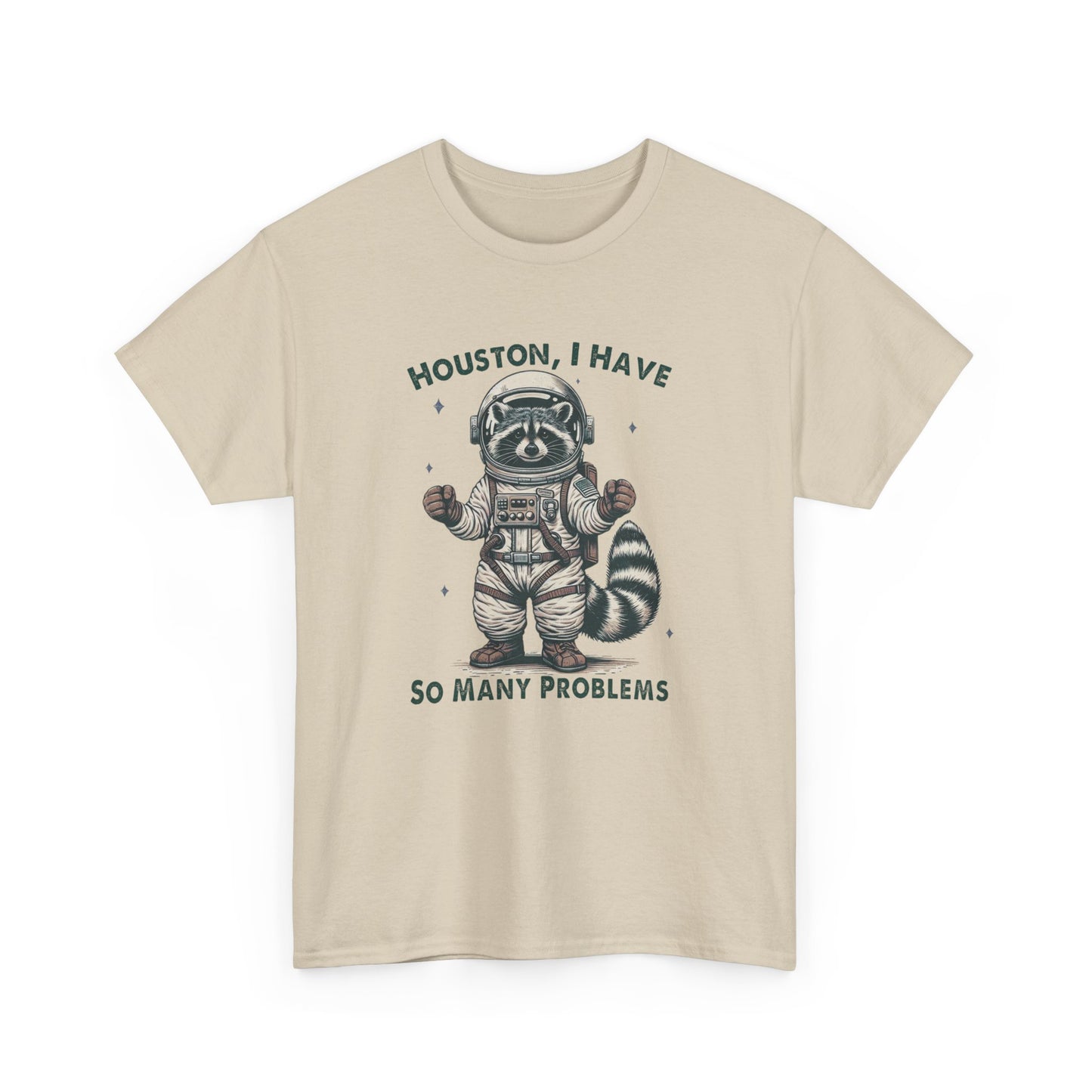 Front view of a beige T-shirt featuring an astronaut raccoon graphic with the text "Houston, I Have So Many Problems." Part of the Vivid Divergence Sensory Friendly Unisex Tees Range.