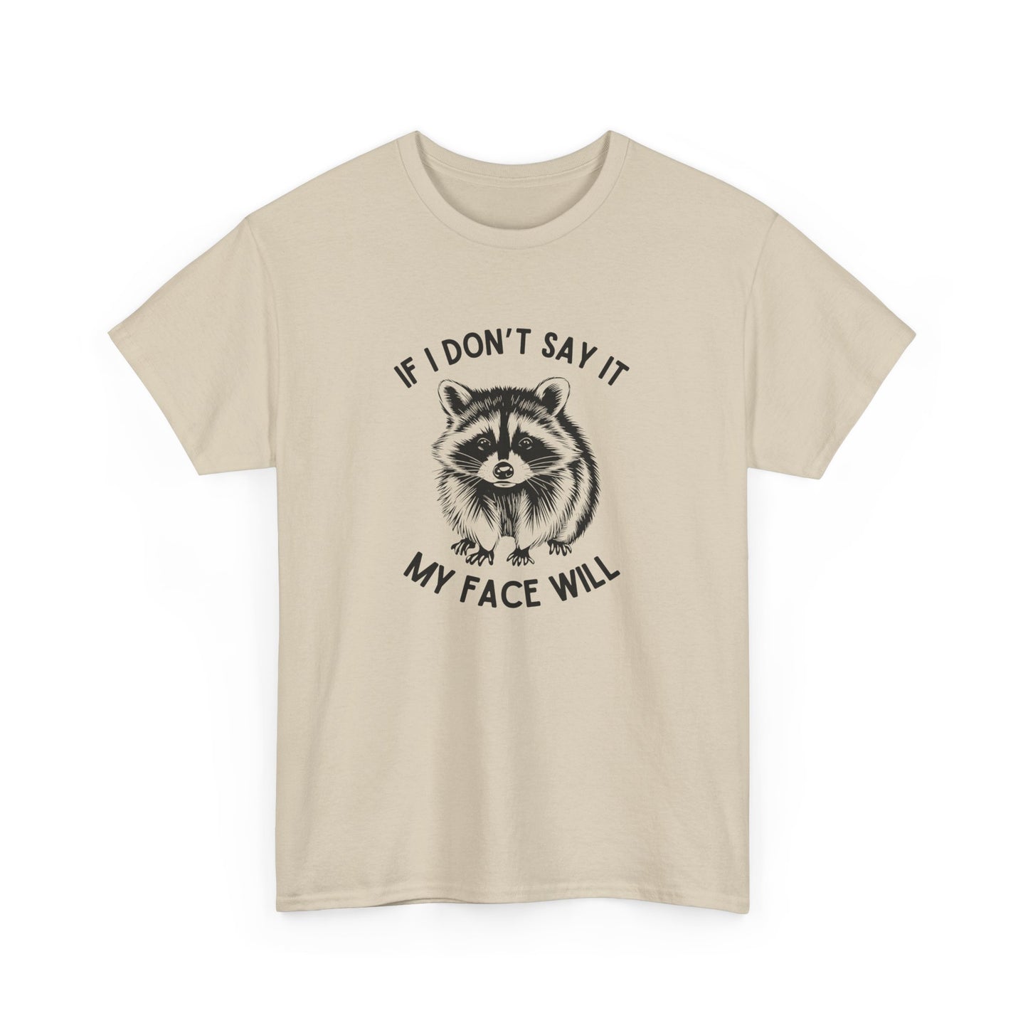 Front view of a beige T-shirt featuring a raccoon face graphic with the text "If I Don't Say It, My Face Will." Part of the Vivid Divergence Sensory Friendly Unisex Tees Range.