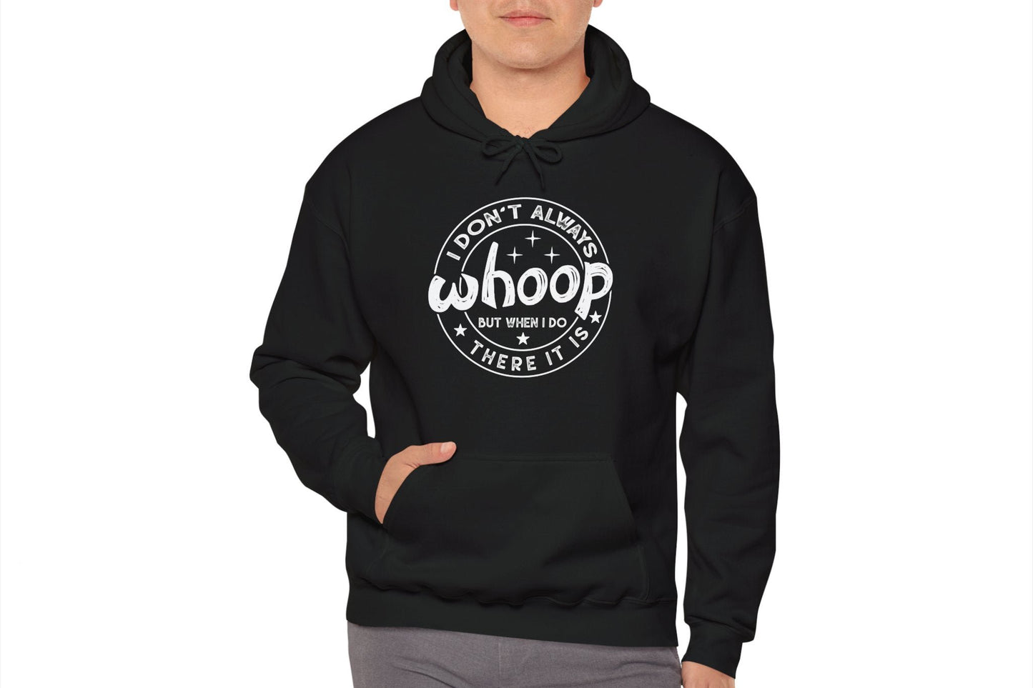 Model wearing a black hoodie featuring the text "I Don’t Always Whoop, But When I Do, There It Is" in a circular badge design. Part of the Vivid Divergence Sensory Friendly Unisex Hoodie Range.
