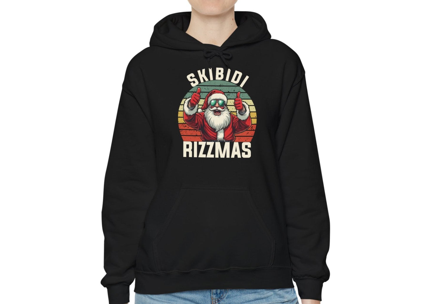 Model wearing a black hoodie with a Skibidi Rizzmas festive design, perfect for the holiday season. Part of the Vivid Divergence Sensory Friendly Unisex Hoodies Range.