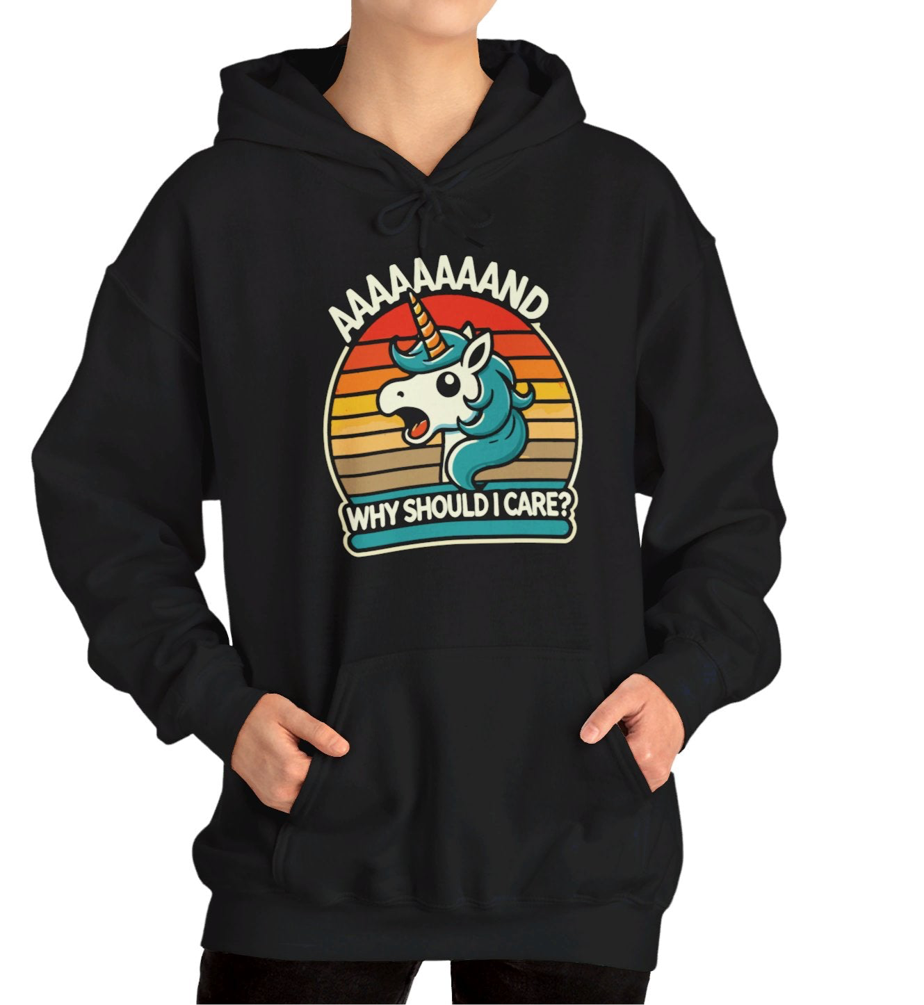 Model wearing a black hoodie with a "Aaaaand Why Should I Care?" text and unicorn rainbow retro graphic. Part of the Vivid Divergence Sensory Friendly Unisex Hoodie Range.
