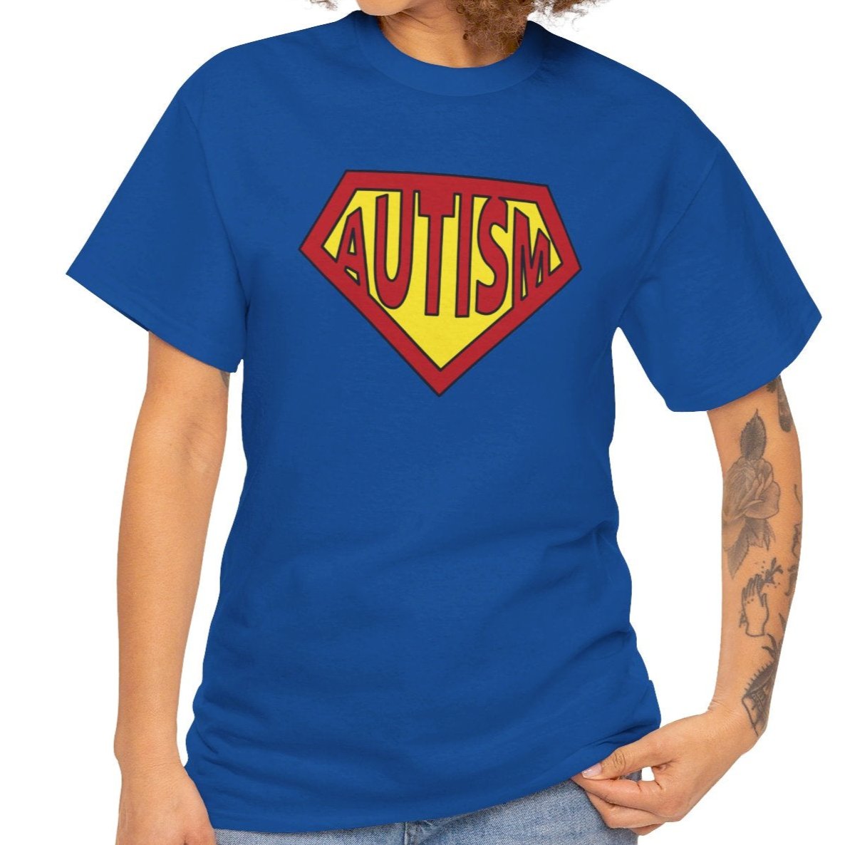 person wearing a blue Autism Superpower T-shirt with rolled-up sleeves, highlighting the unisex design. Part of the Vivid Divergence Sensory Friendly Unisex Tees Range.