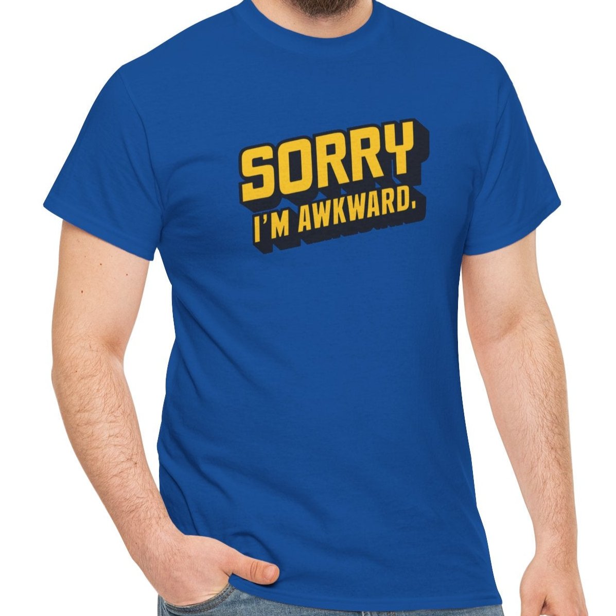 Model wearing a blue T-shirt with "Sorry I'm Awkward" in bold yellow text. Part of the Vivid Divergence Sensory Friendly Unisex Tees Range.