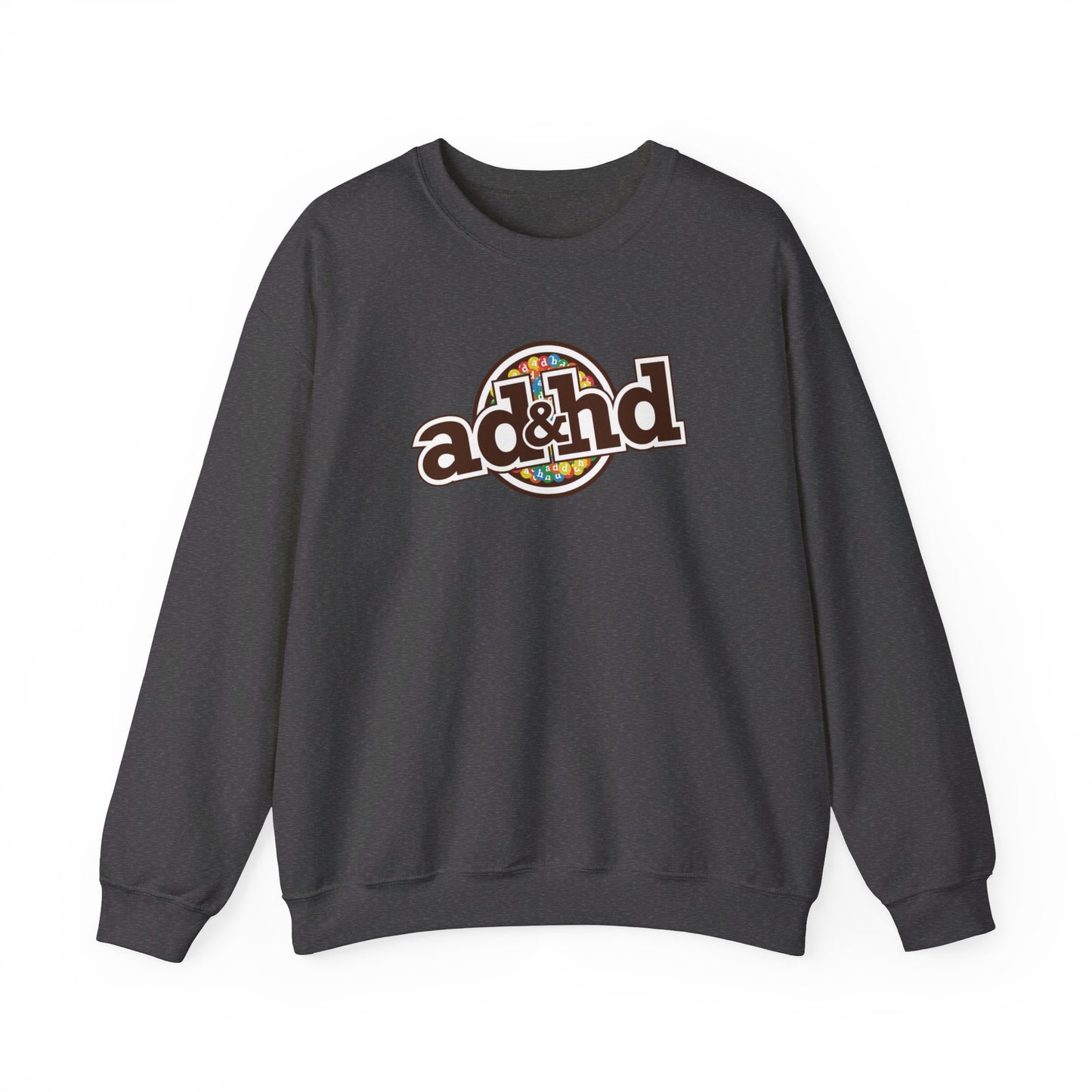 Flat-lay of a dark gray sweater jumper with an "ADHD" m&m brand parody design in brown and yellow tones. Part of the Vivid Divergence Sensory Friendly Unisex Sweater Jumper Range.