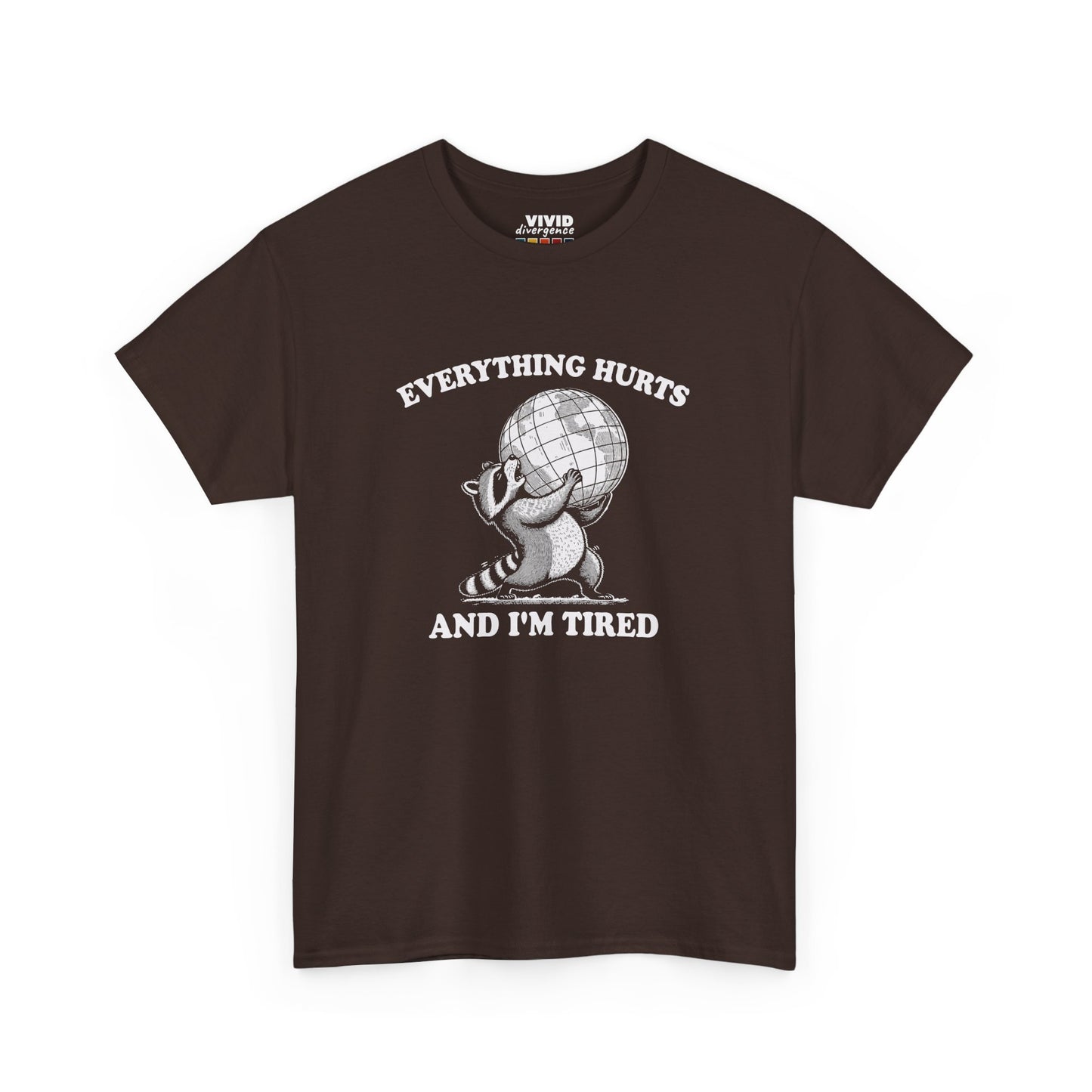 Front view of chocolate brown T-shirt featuring a vintage style sketch of a raccoon carrying the world with the phrase “Everything Hurts and I’m Tired.” The official uniform of burnt out. Part of the Vivid Divergence Memewear Collection!