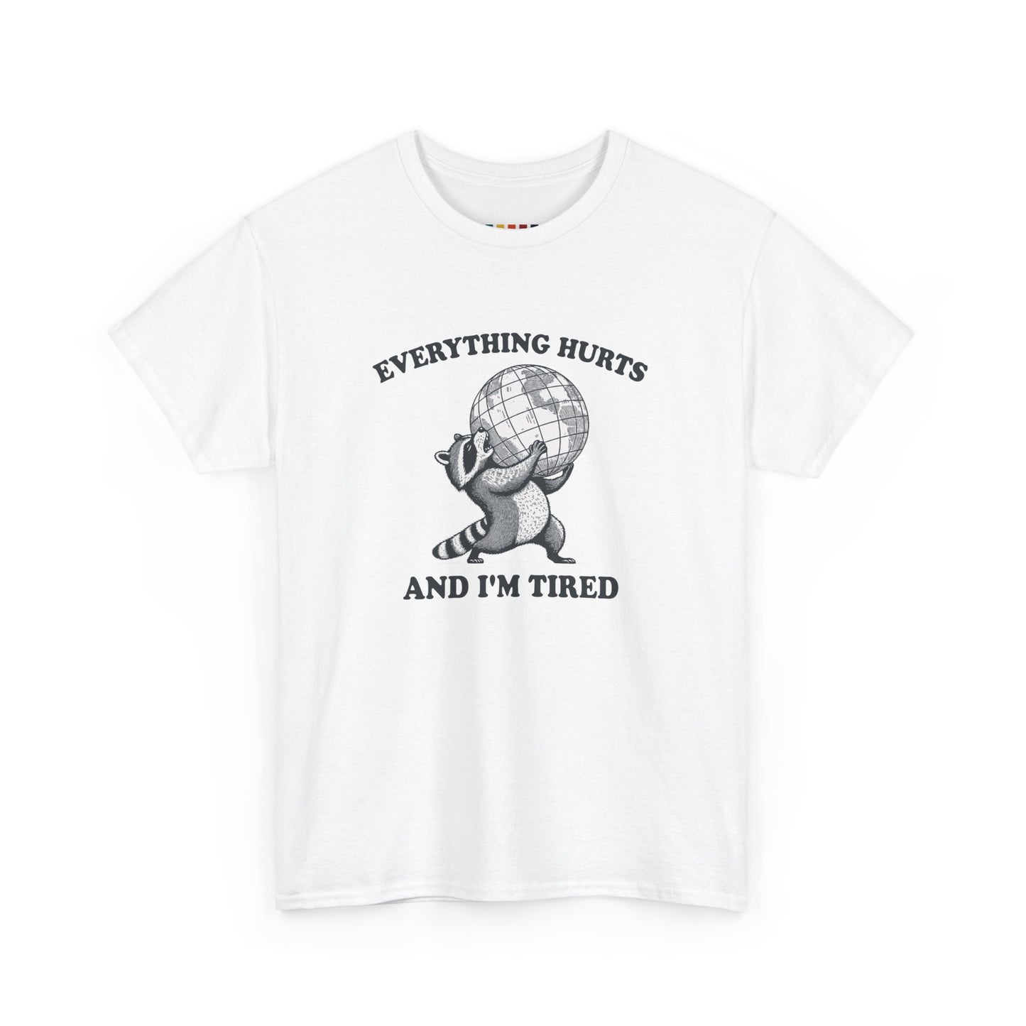 Front view of white T-shirt featuring a vintage style sketch of a raccoon carrying the world with the phrase “Everything Hurts and I’m Tired.” The official uniform of burnt out. Part of the Vivid Divergence Memewear Collection!