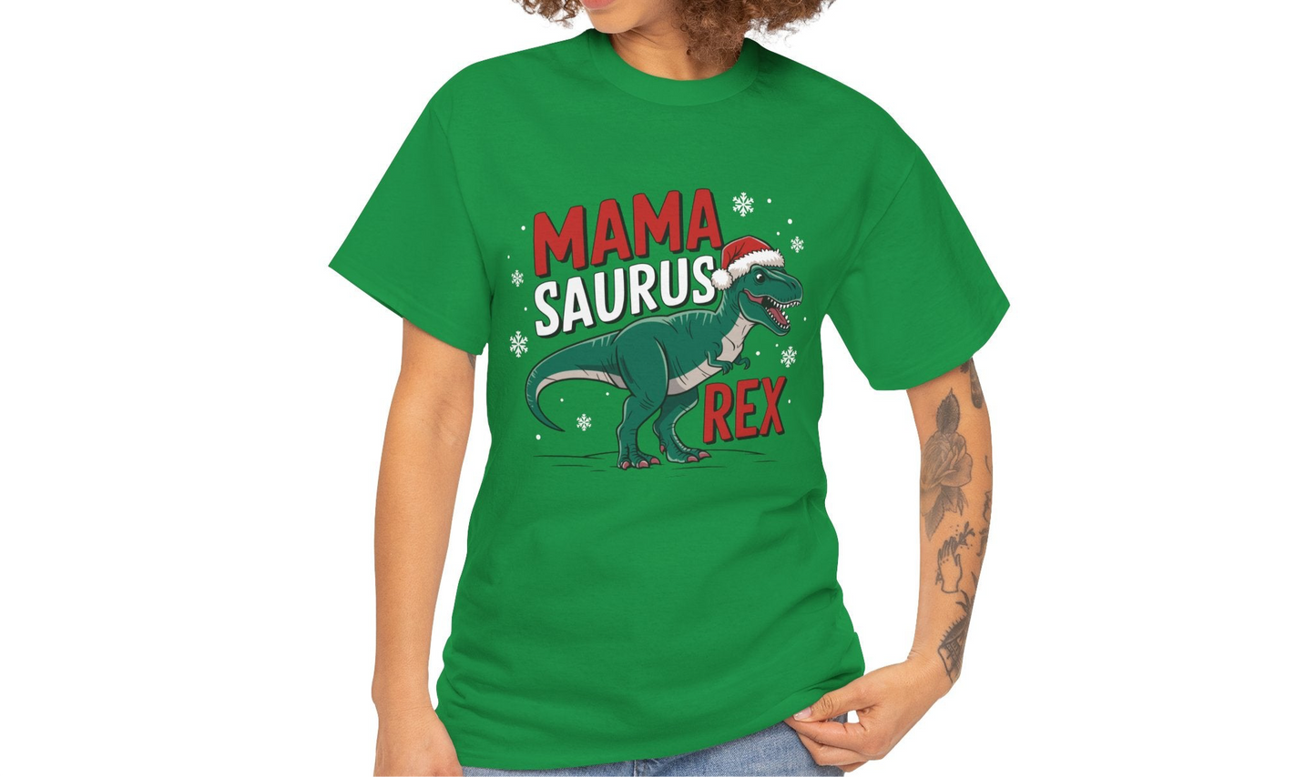 Model wearing a green T-shirt featuring a "Mama-Saurus Rex" design with a festive dinosaur illustration, styled casually with a denim jacket. Part of the Vivid Divergence Sensory Friendly Unisex Tees Range.