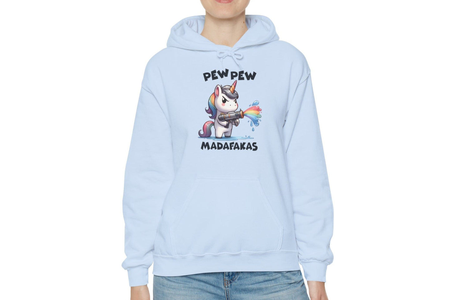 Model wearing a light blue hoodie featuring the text "Pew Pew Madafakas" and a cartoon illustration of a unicorn holding a rainbow water gun. Part of the Vivid Divergence Sensory Friendly Unisex Hoodie Range.