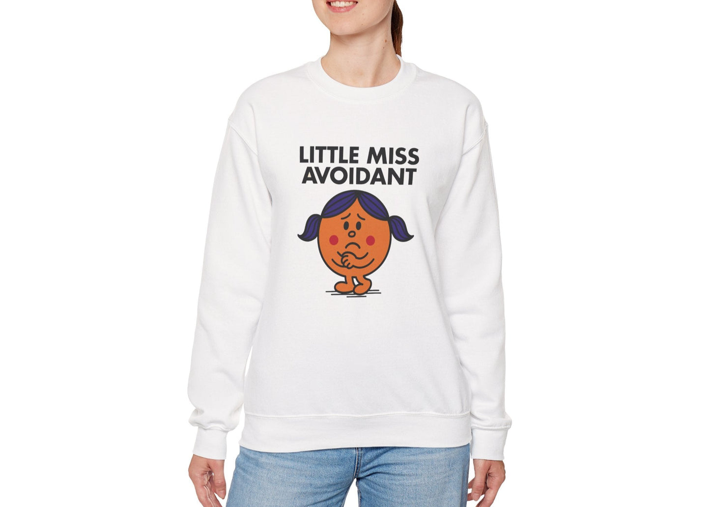 Person wearing the Little Miss Avoidant sweatshirt with blue jeans. Part of the Little Miss Meme Character Collection. A Vivid Divergence Sensory Friendly Sweater Jumper.