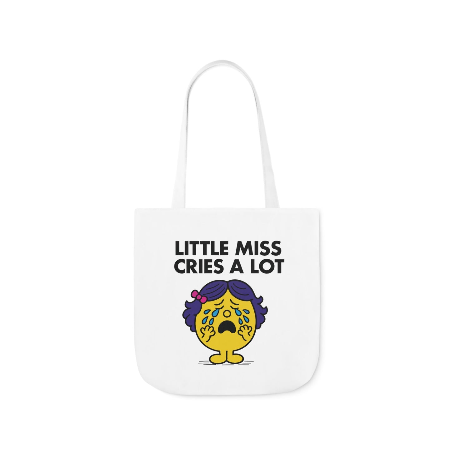 Straight-on view of tote bag with Little Miss Cries A Lot looking overwhelmed and on the verge. It’s fine. She’s fine. Part of the Vivid Divergence Little Miss Meme Collection!