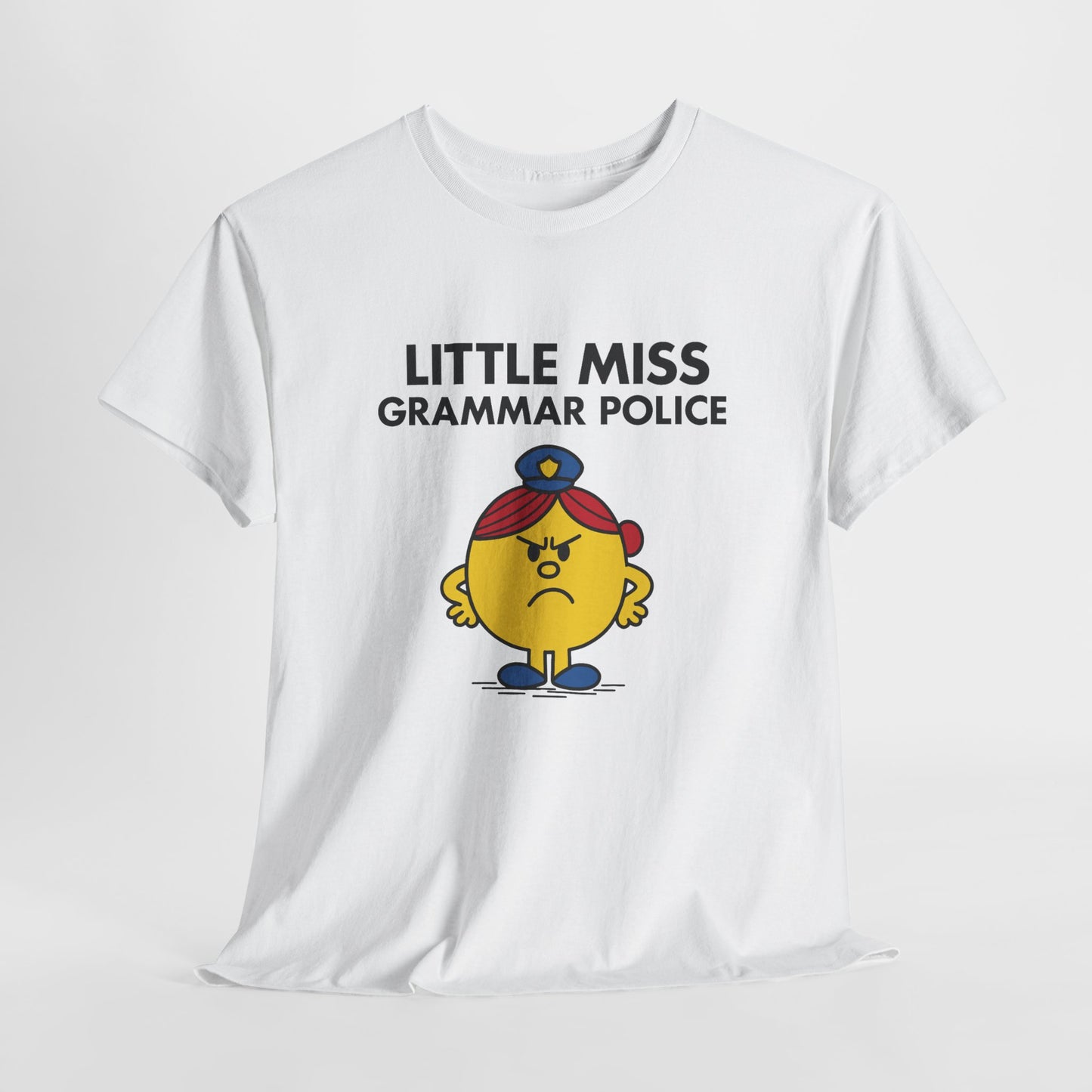 White Little Miss Grammar Police T-shirt laid flat to display the full design. Part of the Little Miss Meme Character Collection. A Vivid Divergence Sensory Friendly Unisex Tee.