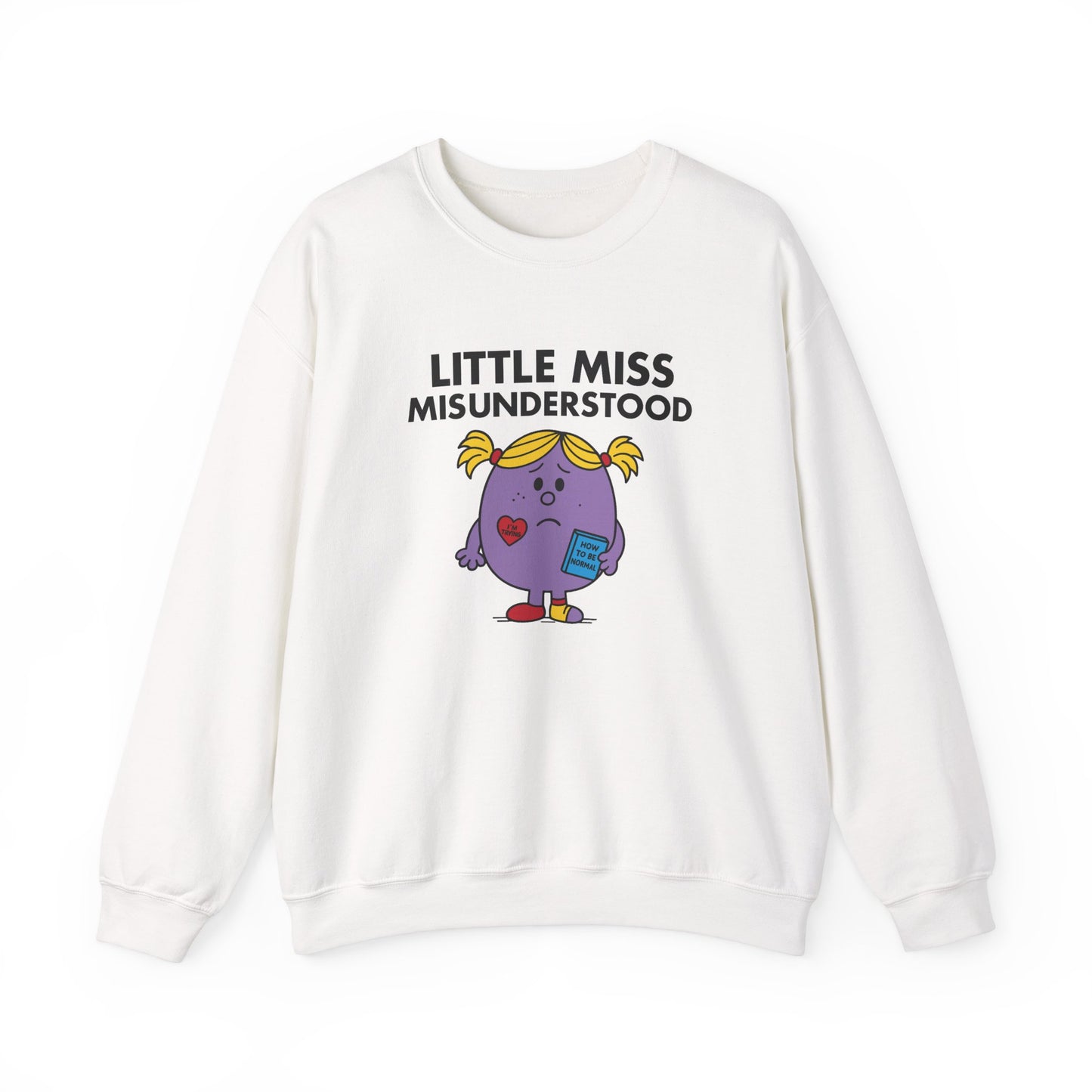 Front view of a white sweatshirt featuring the Little Miss Misunderstood cartoon graphic. Part of the Little Miss Meme Character Collection. A Vivid Divergence Sensory Friendly Sweater Jumper.