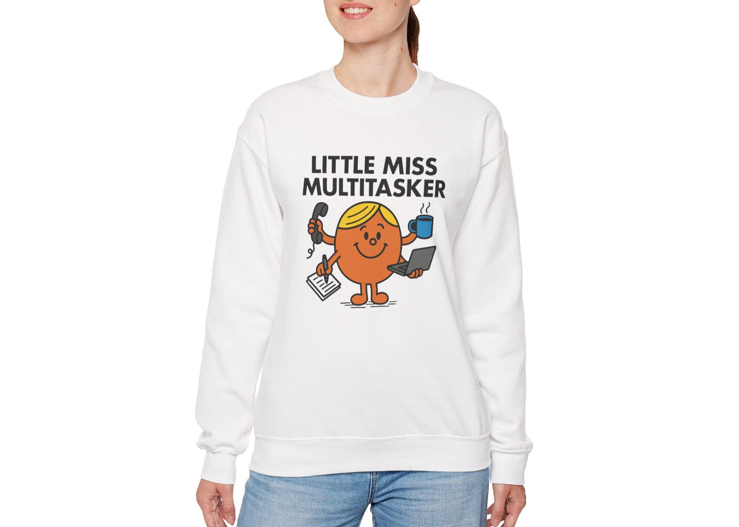 Person wearing the Little Miss Multitasker sweatshirt with blue jeans. Part of the Little Miss Meme Character Collection. A Vivid Divergence Sensory Friendly Sweater Jumper.