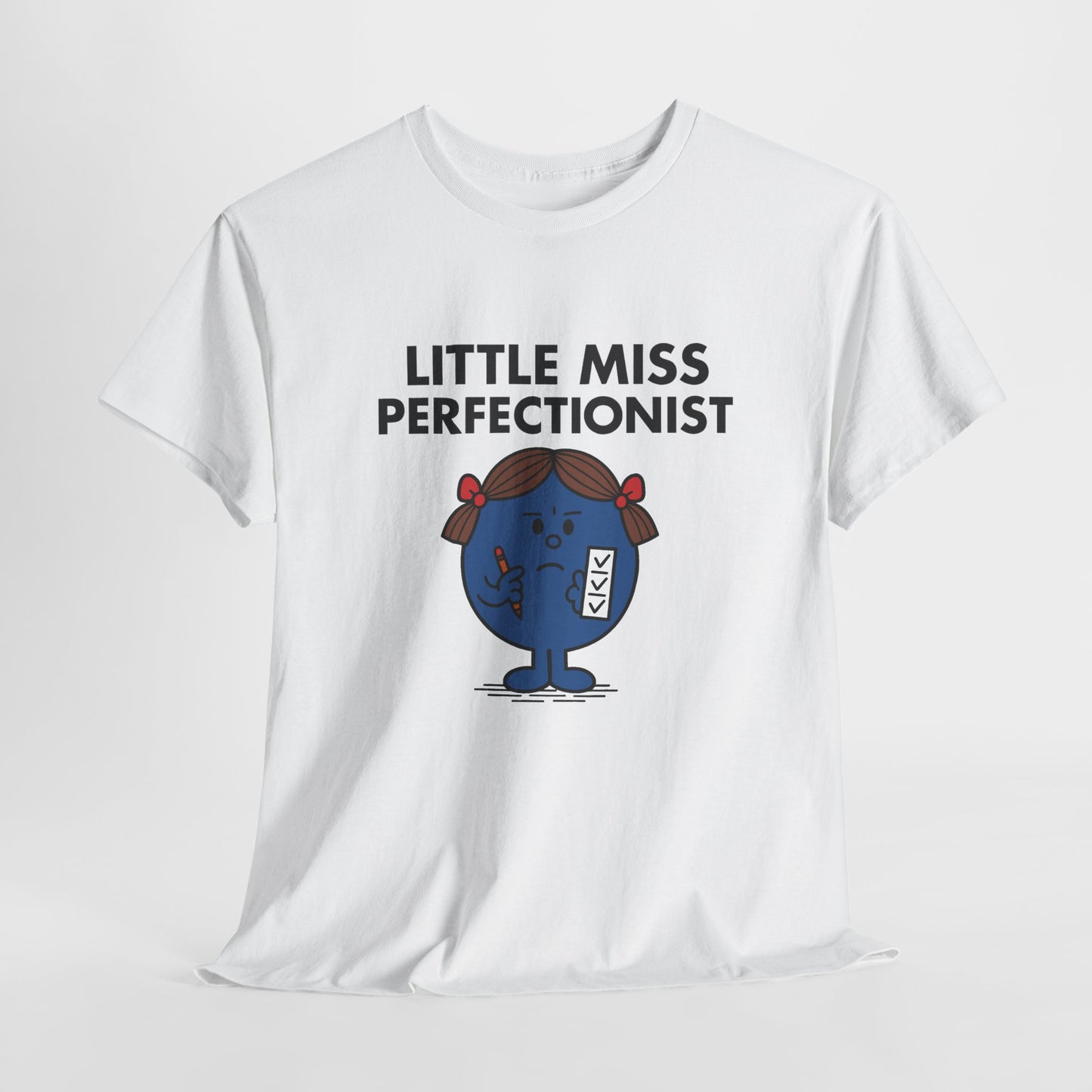 White Little Miss Perfectionist T-shirt laid flat to highlight the design. Part of the Little Miss Meme Character Collection. A Vivid Divergence Sensory Friendly Unisex Tee.