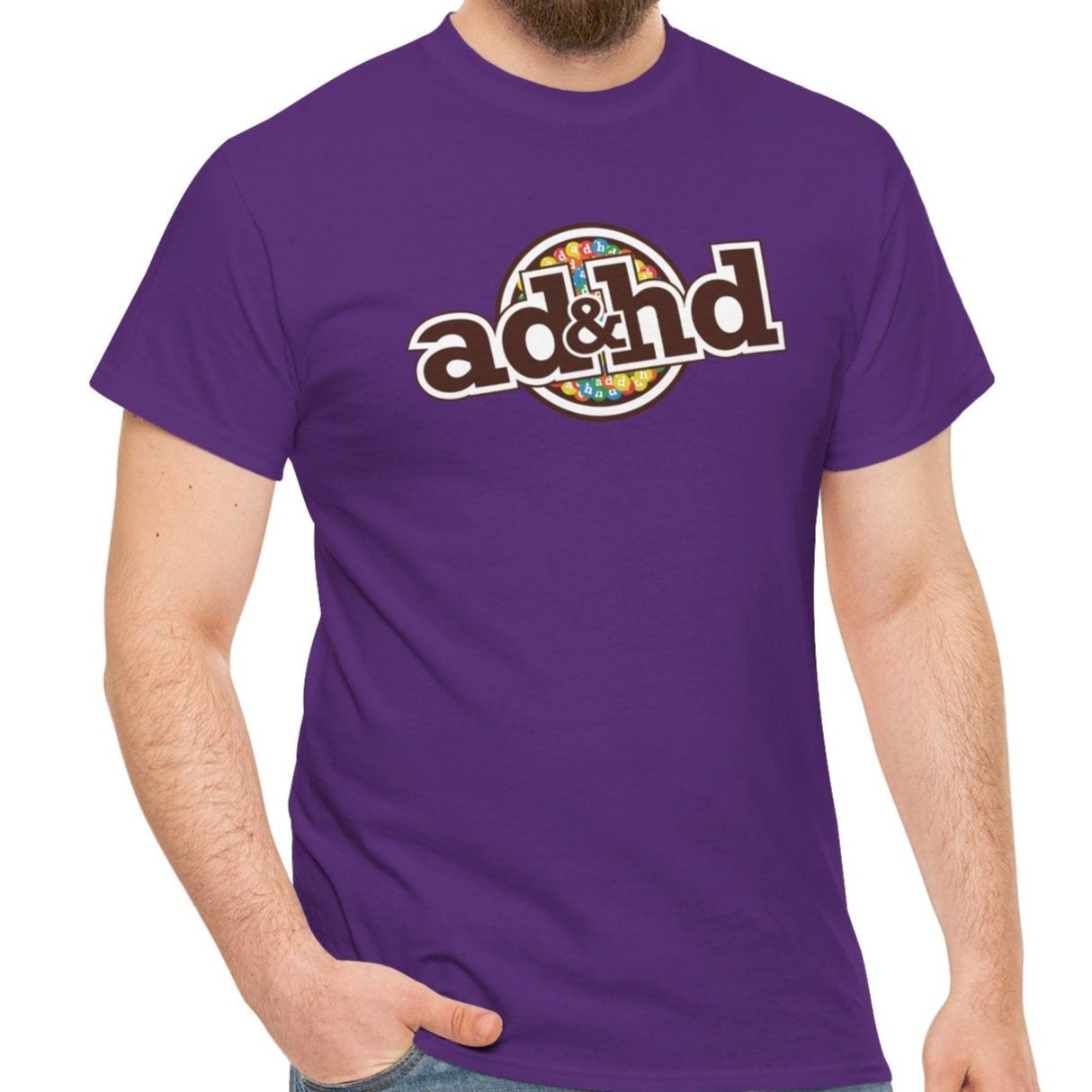 Male model wearing a purple ADHD parody T-shirt inspired by M&M candy branding. Part of the Vivid Divergence Sensory Friendly Unisex Tees Range.
