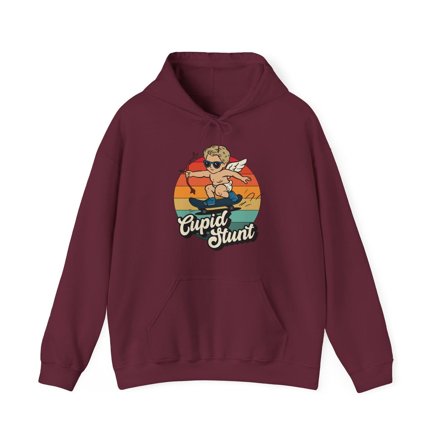 Front view of a maroon hoodie featuring a retro-style sunset background with an illustration of Cupid riding a skateboard and the text "Cupid Stunt." Part of the Vivid Divergence Sensory Friendly Unisex Hoodie Range.