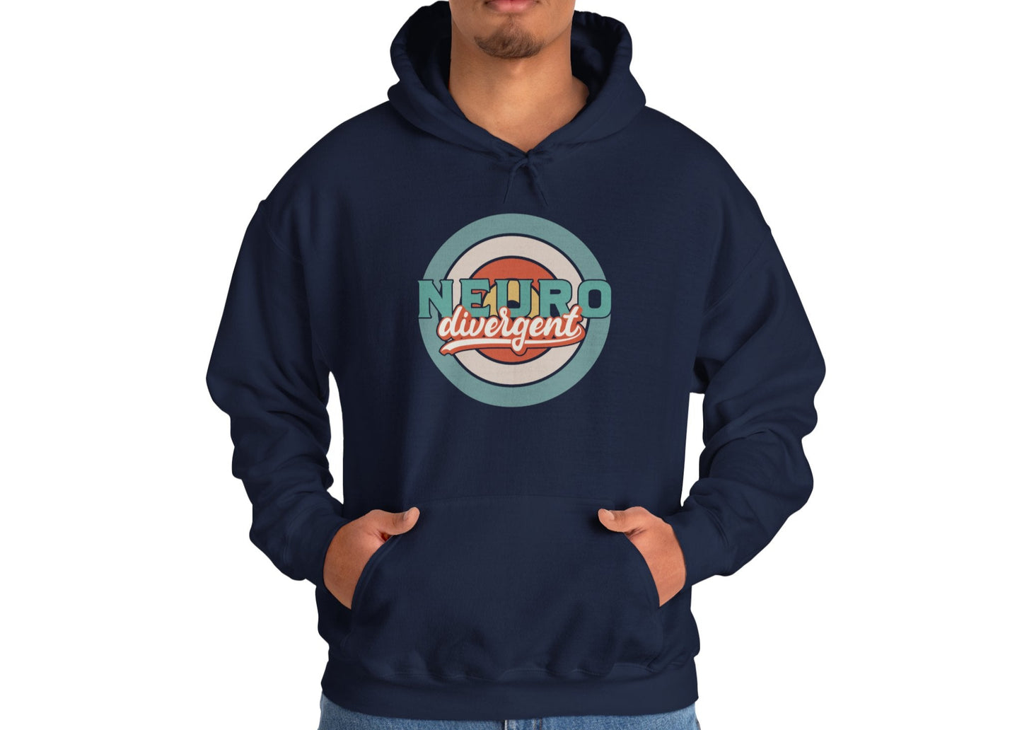 Model wearing a navy blue hoodie with a retro-style circular target design and the word "Neurodivergent," standing with hands in pockets. Part of the Vivid Divergence Sensory Friendly Unisex Hoodie Range.