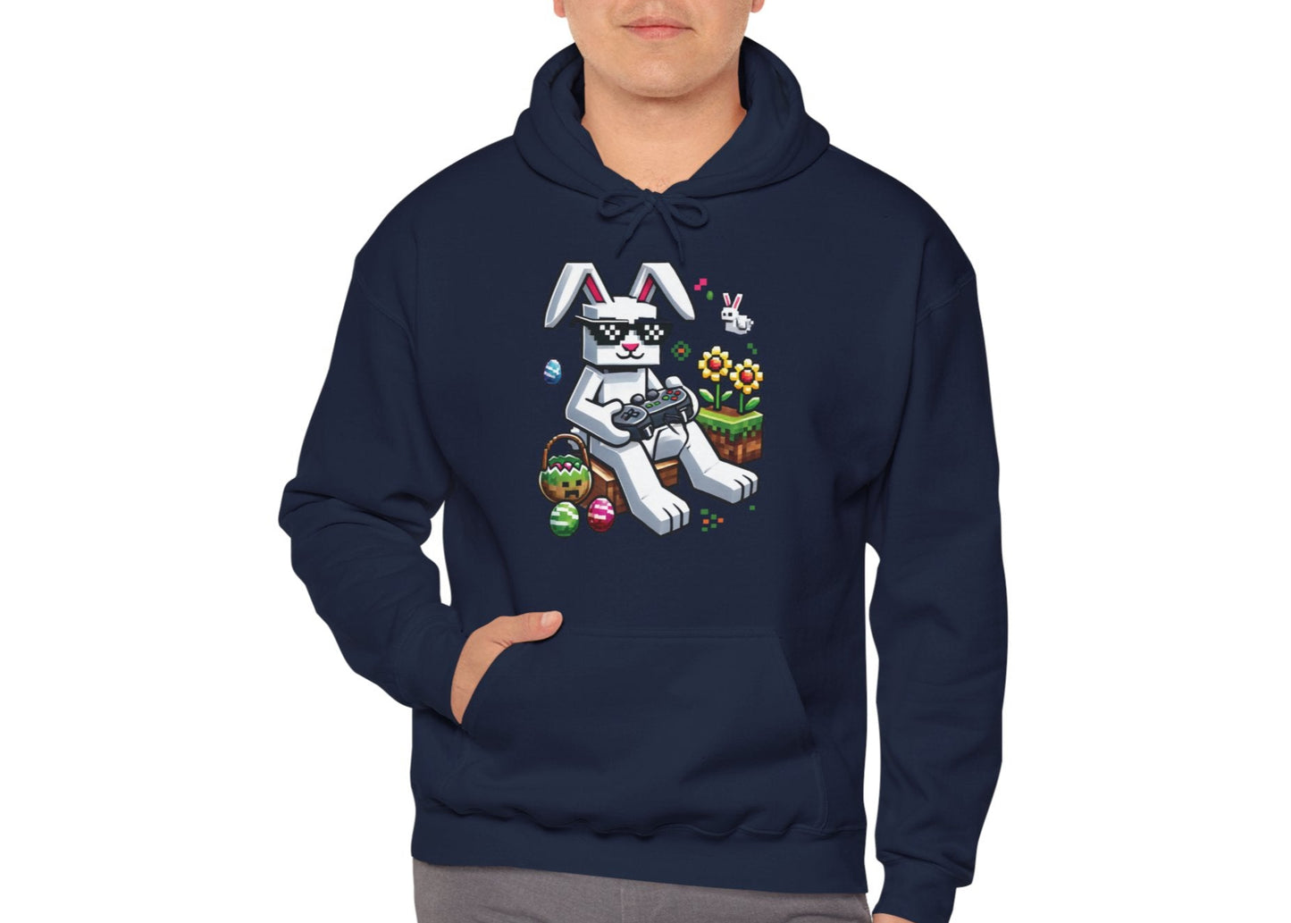 Man wearing navy hoodie with Minecraft bunny and pixel Easter egg print. Part of the Vivid Divergence Sensory Friendly Unisex Hoodies Range.