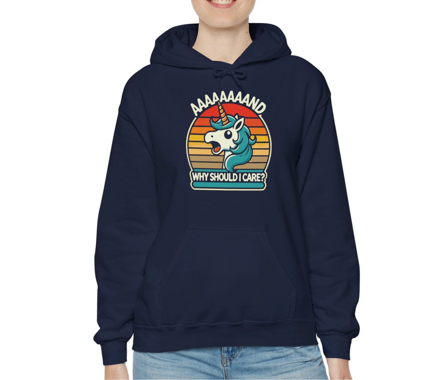 Model wearing a navy hoodie with a "Aaaaand Why Should I Care?" text and unicorn rainbow retro graphic. Part of the Vivid Divergence Sensory Friendly Unisex Hoodie Range.