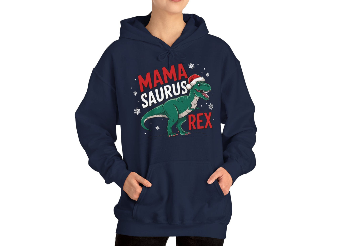 Model wearing a navy blue hoodie featuring a "Mama-Saurus Rex" design with a festive dinosaur illustration, styled casually. Part of the Vivid Divergence Sensory Friendly Unisex Hoodie Range.
