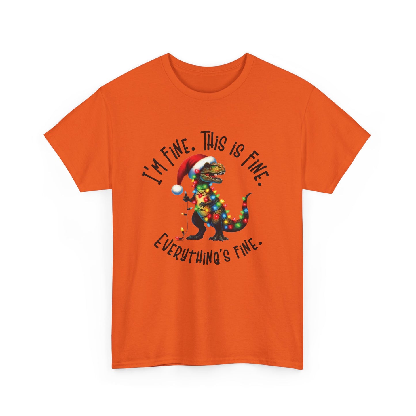 Front view of an orange T-shirt featuring a festive illustration of a dinosaur tangled in Christmas lights with the text "I’m Fine. This is Fine. Everything is Fine." Part of the Vivid Divergence Sensory Friendly Unisex Tees Range.