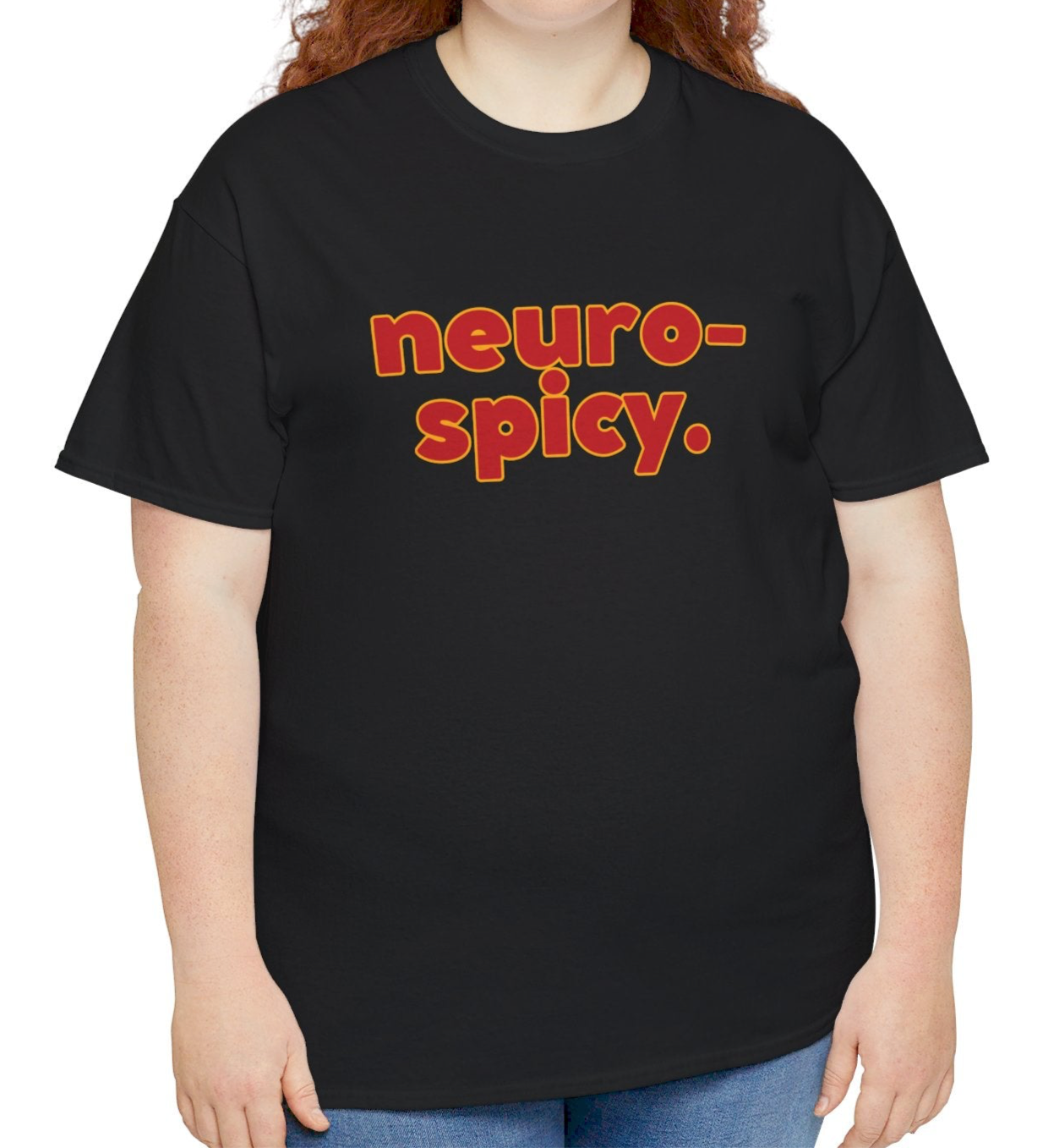 A person wearing a black T-shirt with the text "Neuro-Spicy" in retro-style lettering. Part of the Vivid Divergence Sensory Friendly Unisex Tees Range.