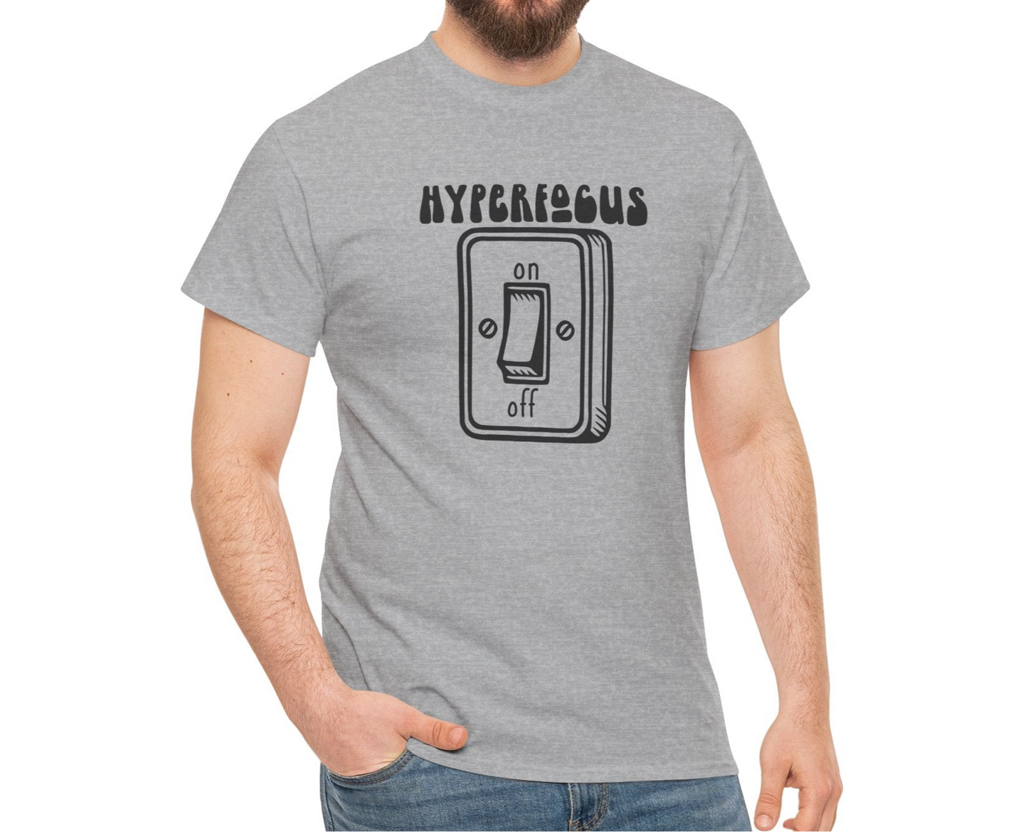 A person wearing a grey T-shirt with the text "Hyperfocus" and an on/off switch graphic design. Part of the Vivid Divergence Sensory Friendly Unisex Tees Range.