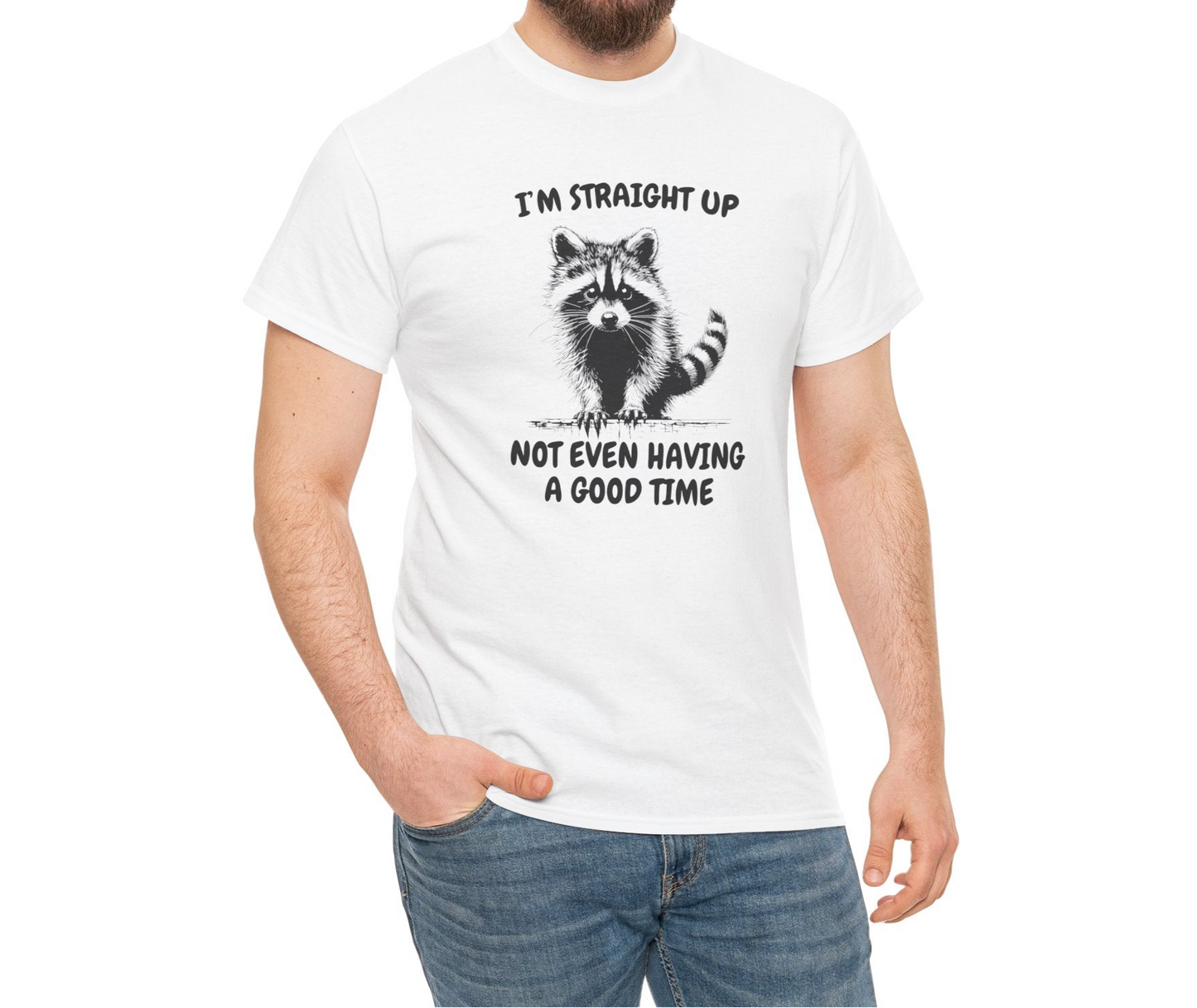 A person wearing a white T-shirt with a distressed raccoon graphic and the text "I'm Straight Up Not Even Having a Good Time." Part of the Vivid Divergence Sensory Friendly Unisex Tees Range.