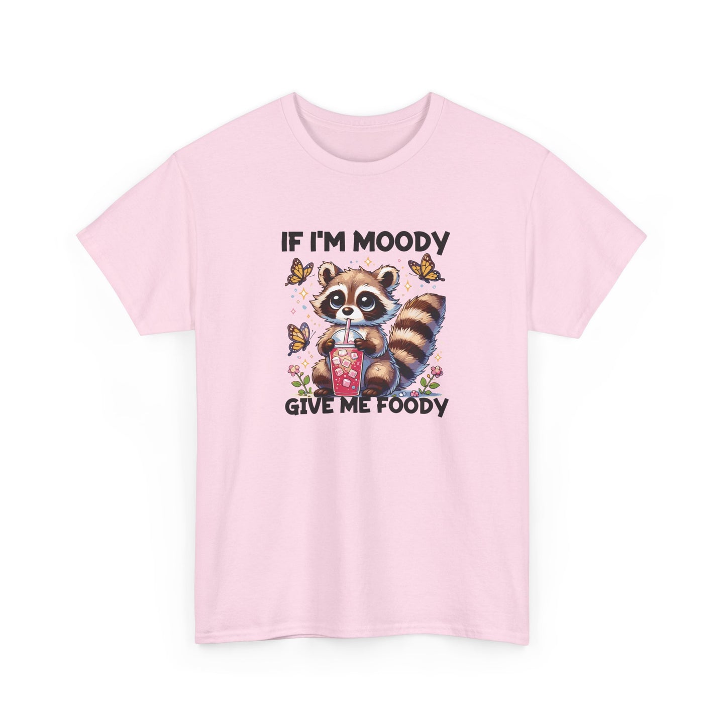 Front view of a pink T-shirt featuring a raccoon graphic with food and the text "If I'm Moody, Give Me Foody." Part of the Vivid Divergence Sensory Friendly Unisex Tees Range.