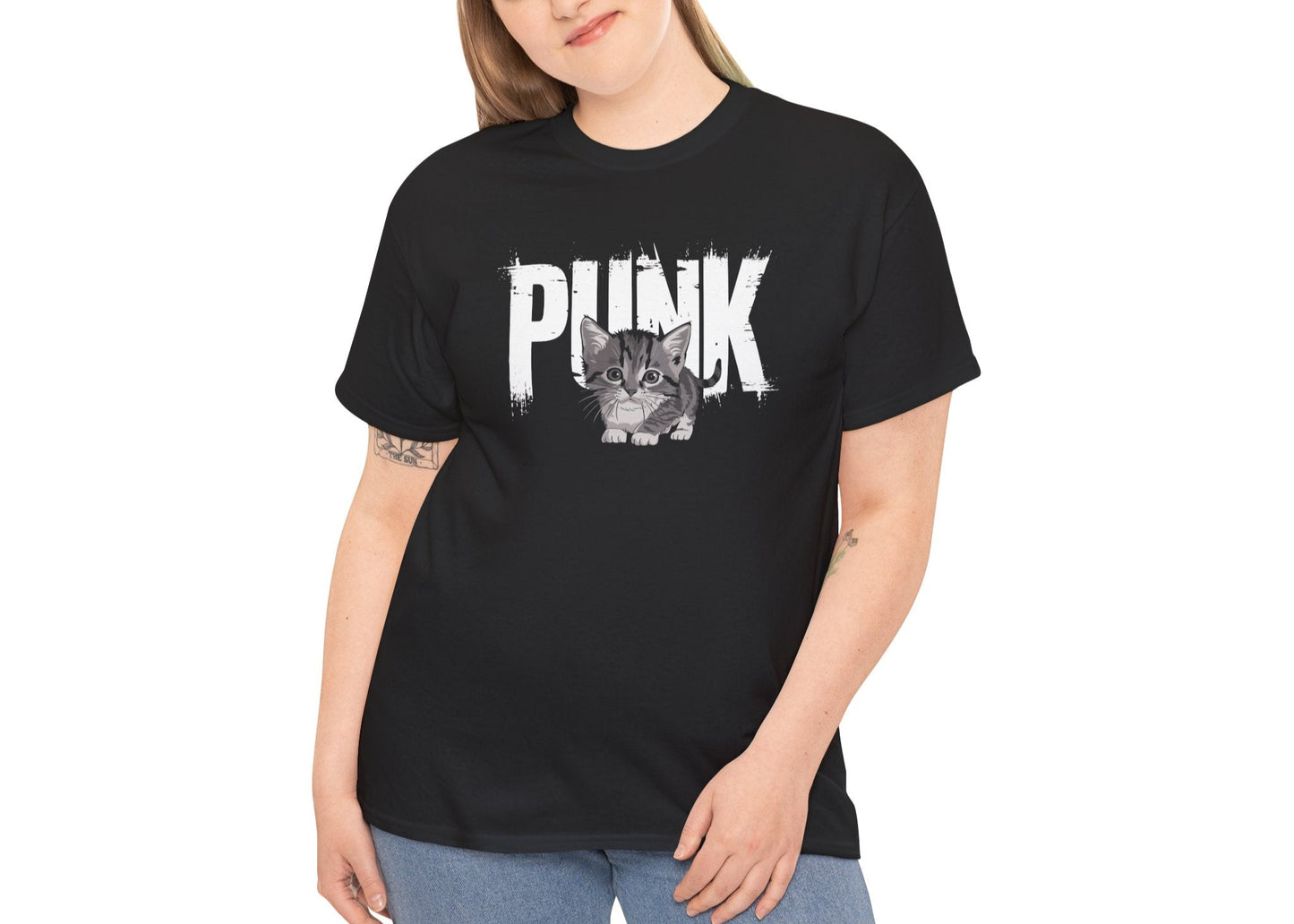 Woman wearing the Punk Kitten meme T-shirt with hands in pockets. She’s grunge, but she’ll still pet the cat. Part of the Vivid Divergence Memewear Collection!