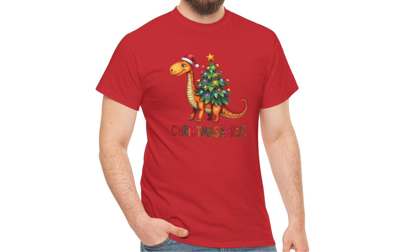 Model wearing a red T-shirt featuring a festive dinosaur decorated as a Christmas tree with ornaments and lights, styled casually for the holiday season. Part of the Vivid Divergence Sensory Friendly Unisex Tees Range.