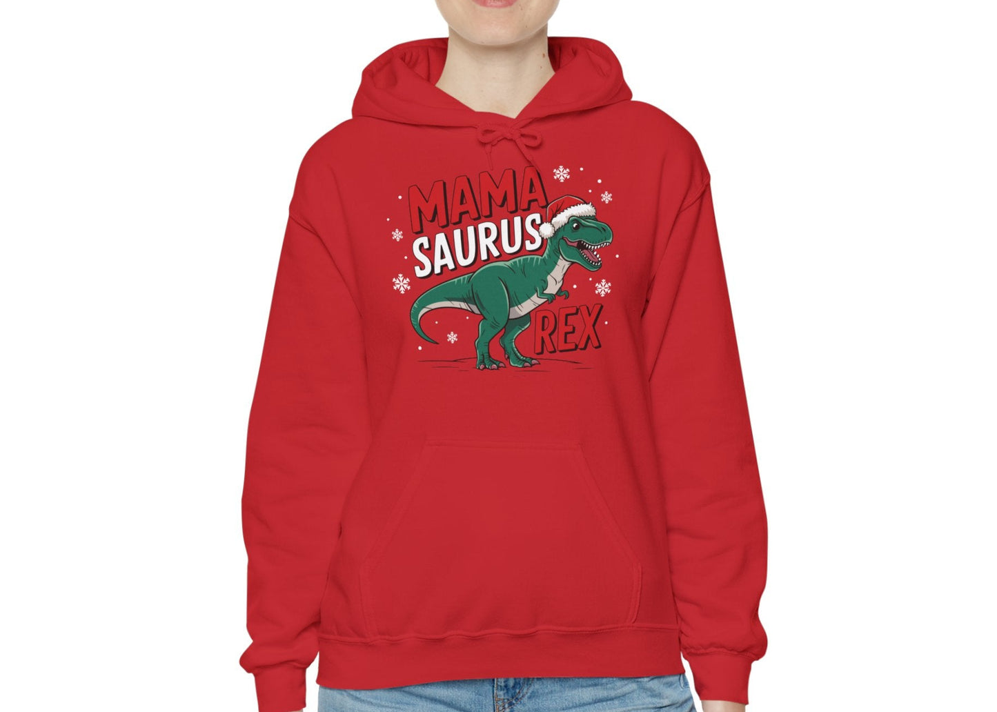Model wearing a red hoodie featuring a "Mama-Saurus Rex" design with a festive dinosaur illustration, styled casually. Part of the Vivid Divergence Sensory Friendly Unisex Hoodie Range.