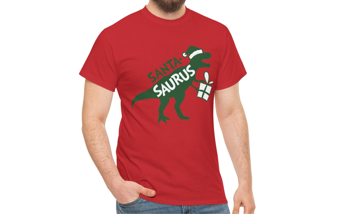 Model wearing a red T-shirt featuring a "Santa-Saurus Rex" design with a red dinosaur wearing a Santa hat and carrying a gift. Part of the Vivid Divergence Sensory Friendly Unisex Tees Range.