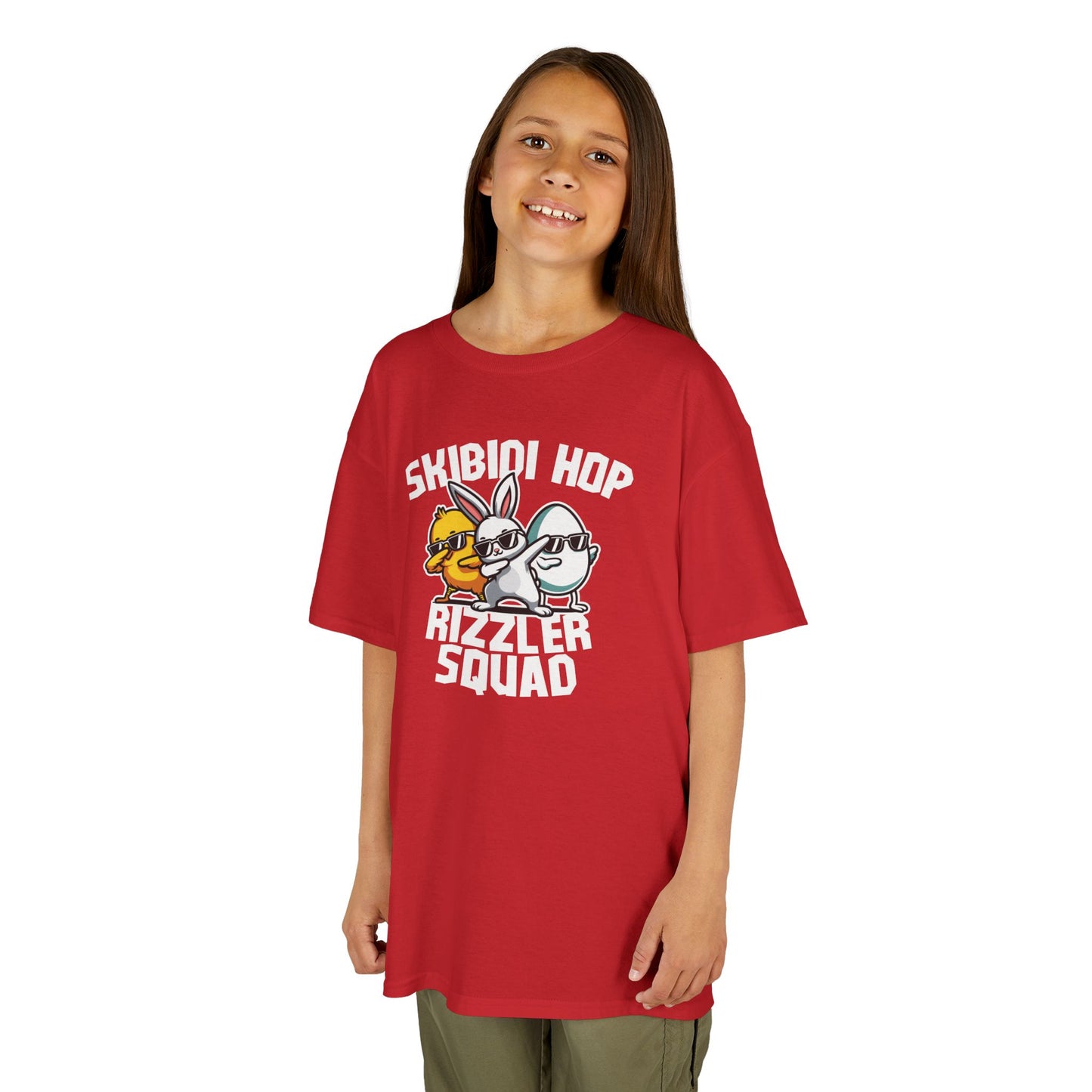 Child wearing a red Easter T-shirt featuring a Skibidi-themed "Rizzler Squad" meme design, a fun and bold choice. Hop into the season in style and shop Easter shirts online today!
