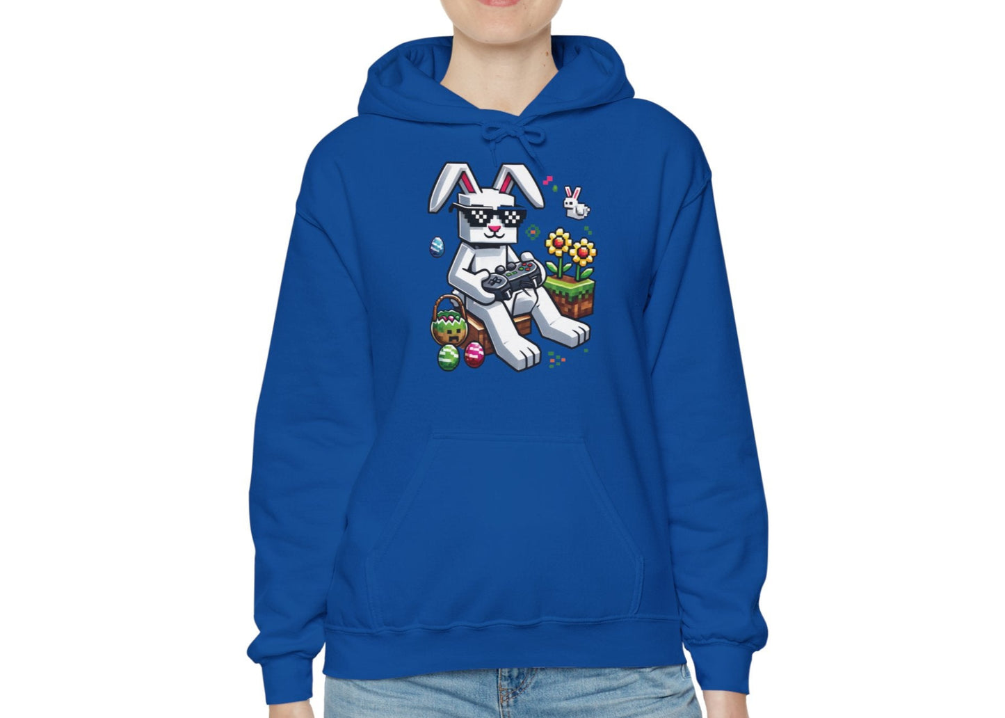 Woman modeling royal blue hoodie with Minecraft bunny and pastel eggs. Part of the Vivid Divergence Sensory Friendly Unisex Hoodies Range.