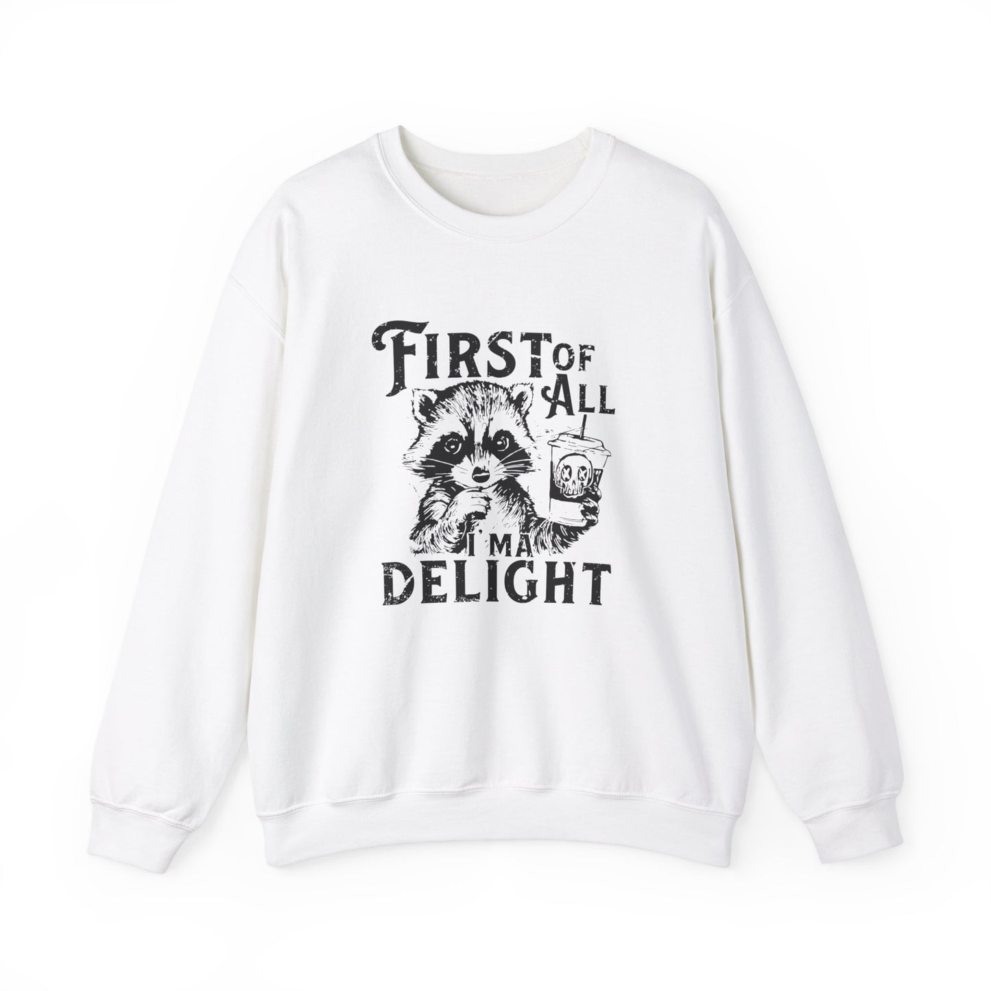 Front view of a white sweater jumper with the text "First of All, I’m a Delight" and a cartoon raccoon illustration. Part of the Vivid Divergence Sensory Friendly Unisex Sweater Jumper Range.