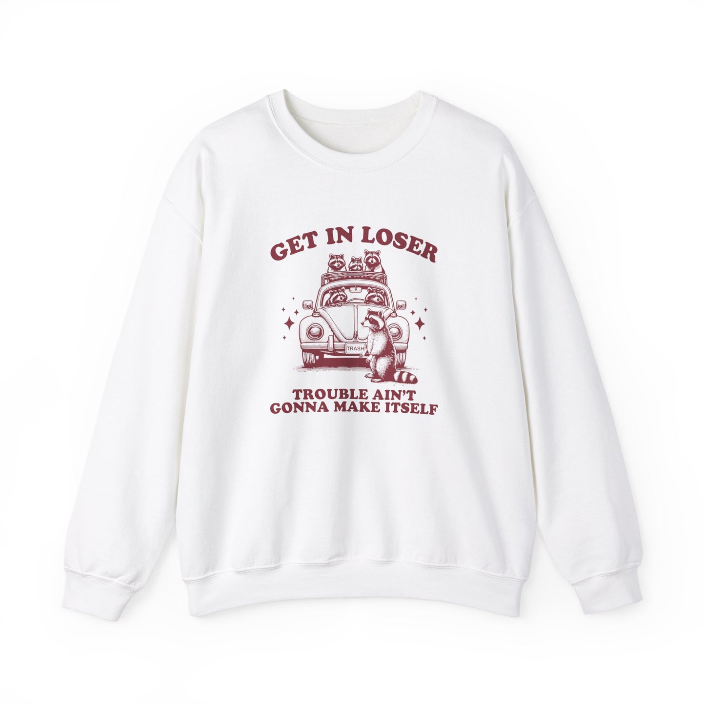 Front view of a white sweatshirt with "Get in Loser, Trouble Ain't Gonna Cause Itself" in red letters and a group of raccoons in a car. Part of the Vivid Divergence Sensory Friendly Unisex Sweater Jumper Range.