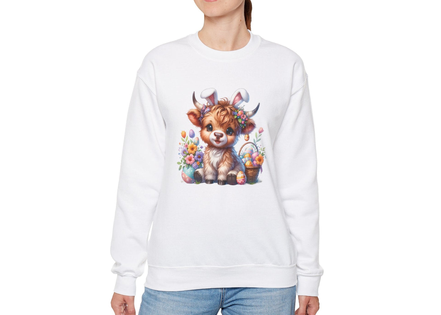 Woman wearing white sweater jumper with Highland cow and colorful Easter eggs. Part of the Vivid Divergence Sensory Friendly Unisex Sweater Jumper Range.