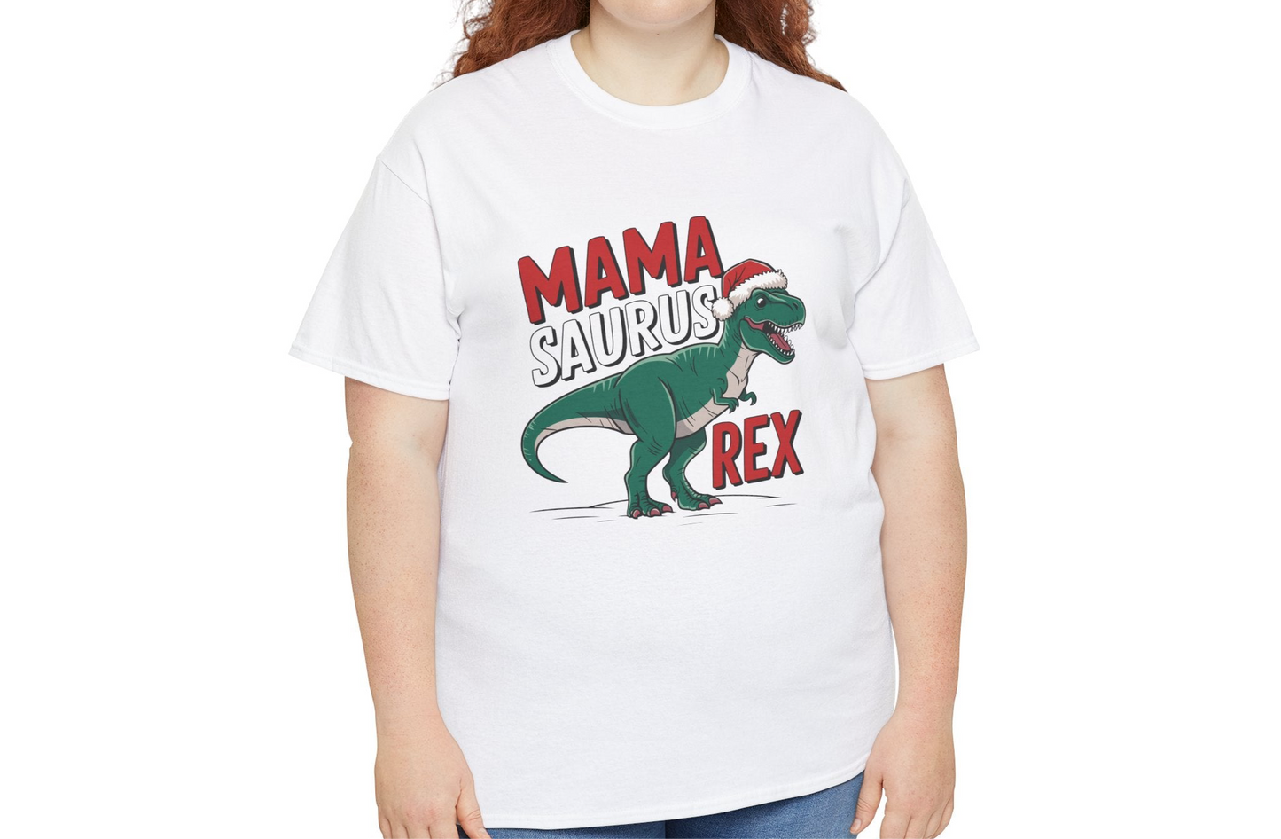 Model wearing a white T-shirt featuring a "Mama-Saurus Rex" design with a festive dinosaur illustration, styled casually with a denim jacket. Part of the Vivid Divergence Sensory Friendly Unisex Tees Range.