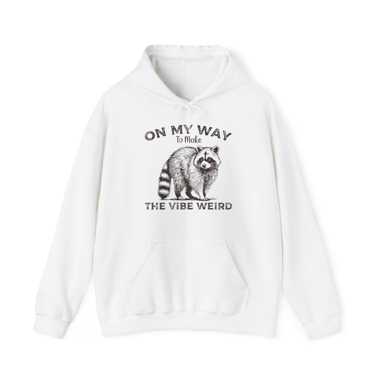 Front view of a white hoodie featuring the text "On My Way to Make the Vibe Weird" and a cartoon illustration of a raccoon holding a stick. Part of the Vivid Divergence Sensory Friendly Unisex Hoodie Range.
