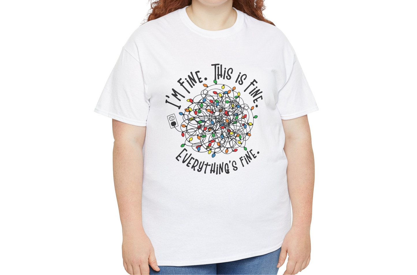 Model wearing a white T-shirt with a colorful tangled Christmas lights design and the phrase "I'm Fine. This is Fine. Everything's Fine." Part of the Vivid Divergence Sensory Friendly Unisex Tees Range.
