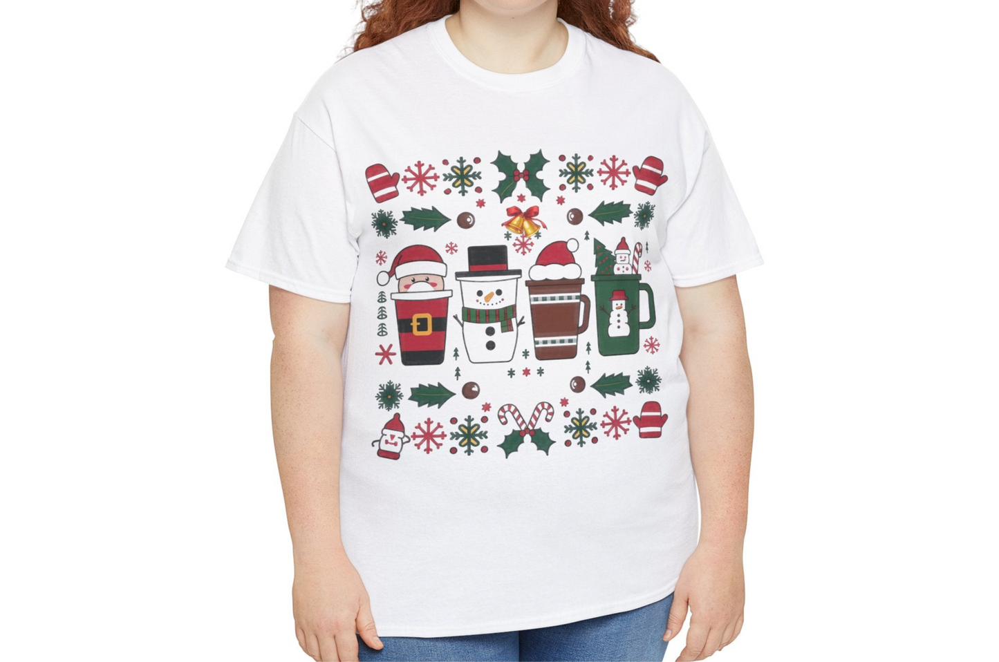 Model wearing a white T-shirt featuring a festive holiday pattern with coffee cups, snowflakes, and Christmas elements, styled casually. Part of the Vivid Divergence Sensory Friendly Unisex Tees Range.
