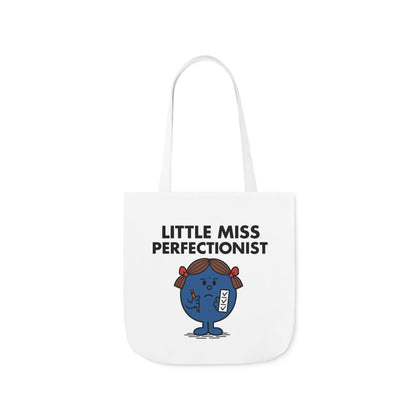 Straight-on view of tote bag with Little Miss Perfectionist standing tense and focused — every detail must be just right. Part of the Vivid Divergence Little Miss Meme Collection!
