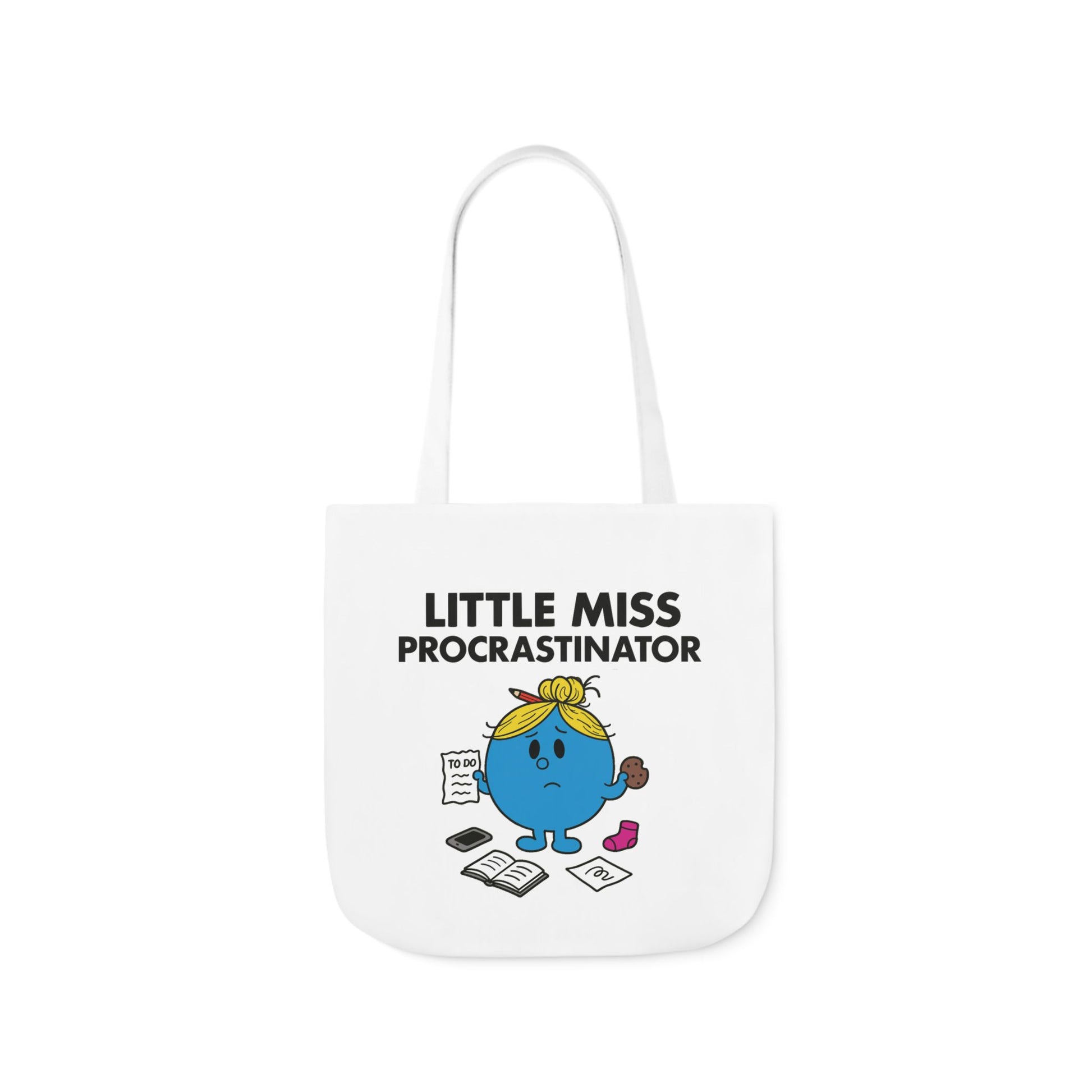Front view of white canvas tote bag featuring blue character with blonde hair, surrounded by scattered papers, coffee, and panic under the text "Little Miss Procrastinator." She swore she'd start earlier this time. Part of the Vivid Divergence Little Miss Meme Collection!
