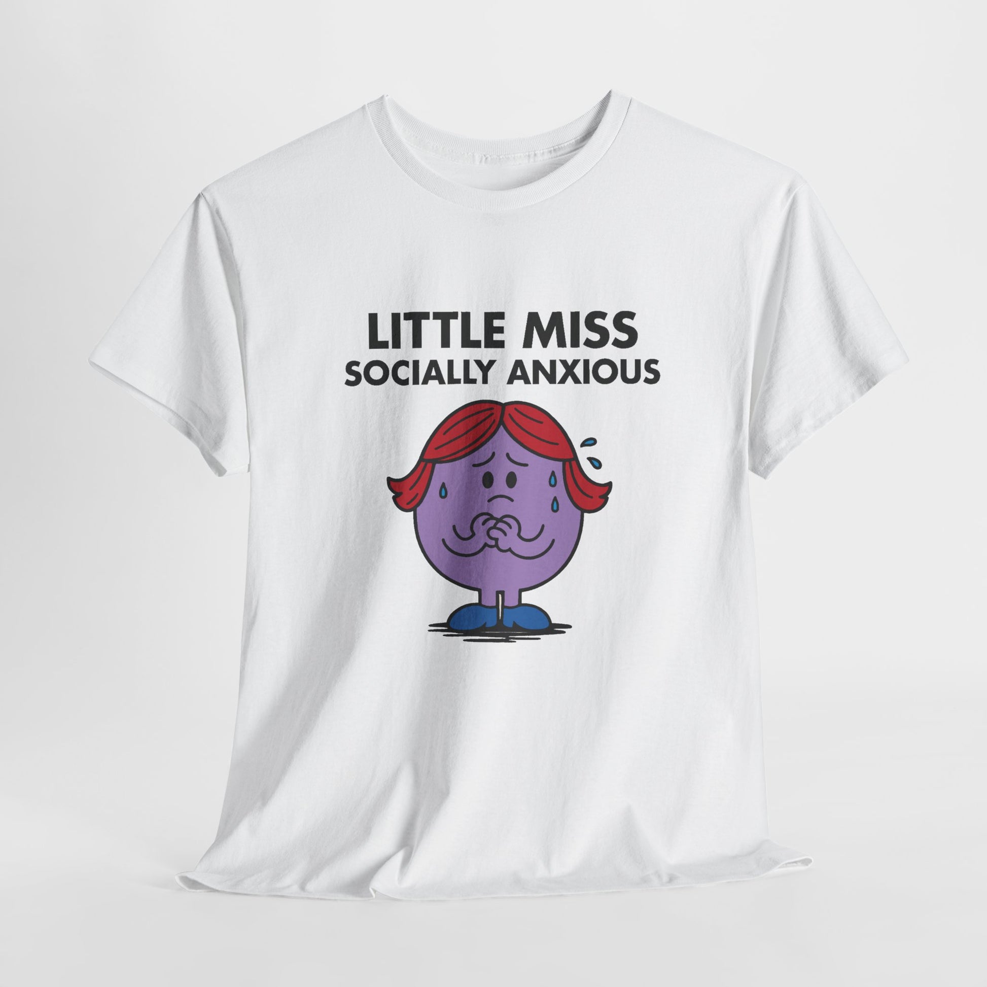 White Little Miss Socially Anxious T-shirt laid flat to highlight the full design. Part of the Little Miss Meme Character Collection. A Vivid Divergence Sensory Friendly Unisex Tee.
