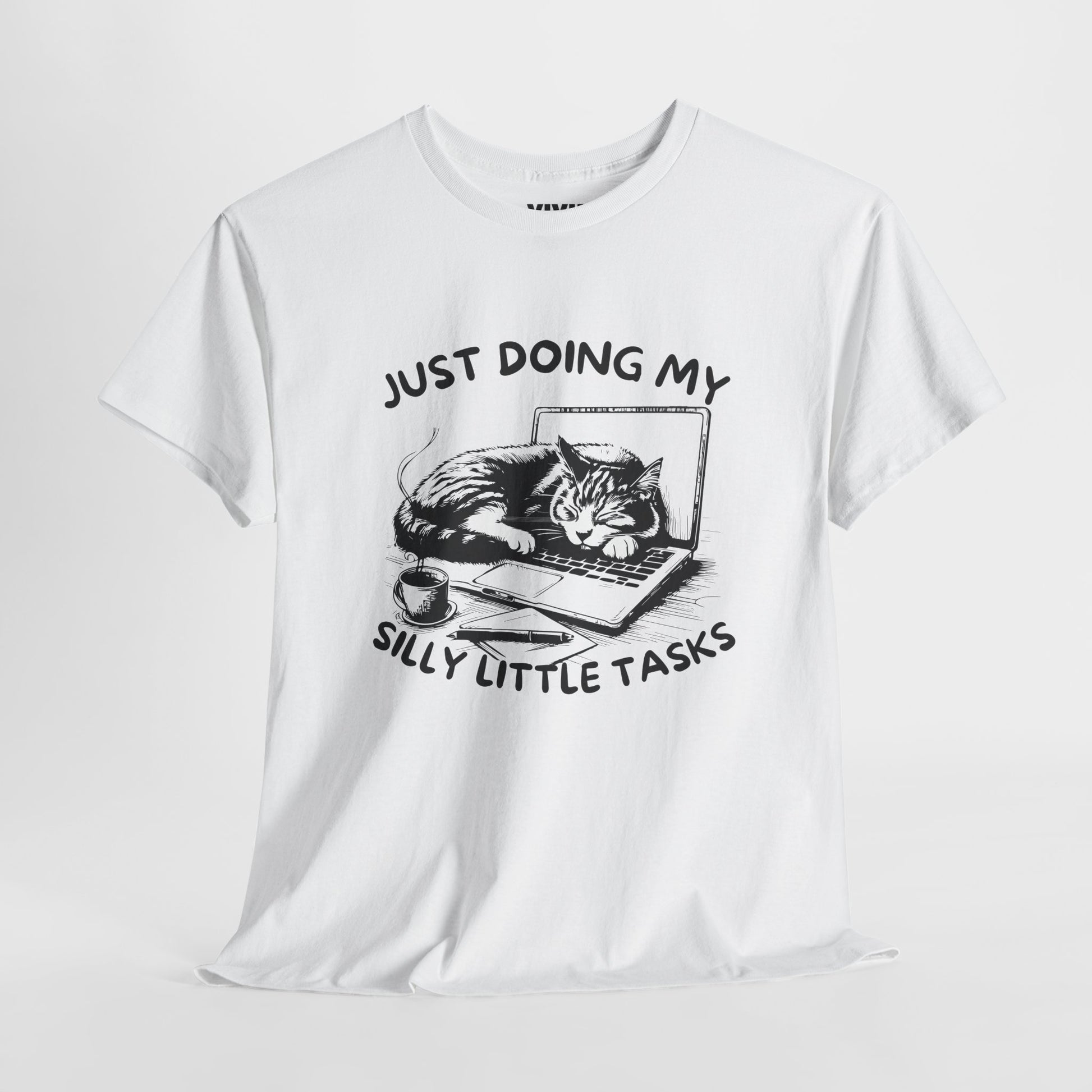 ite T-shirt with cat-laptop graphic hanging on a hanger. Aesthetic minimalism meets passive rebellion. Part of the Vivid Divergence Memewear Collection!