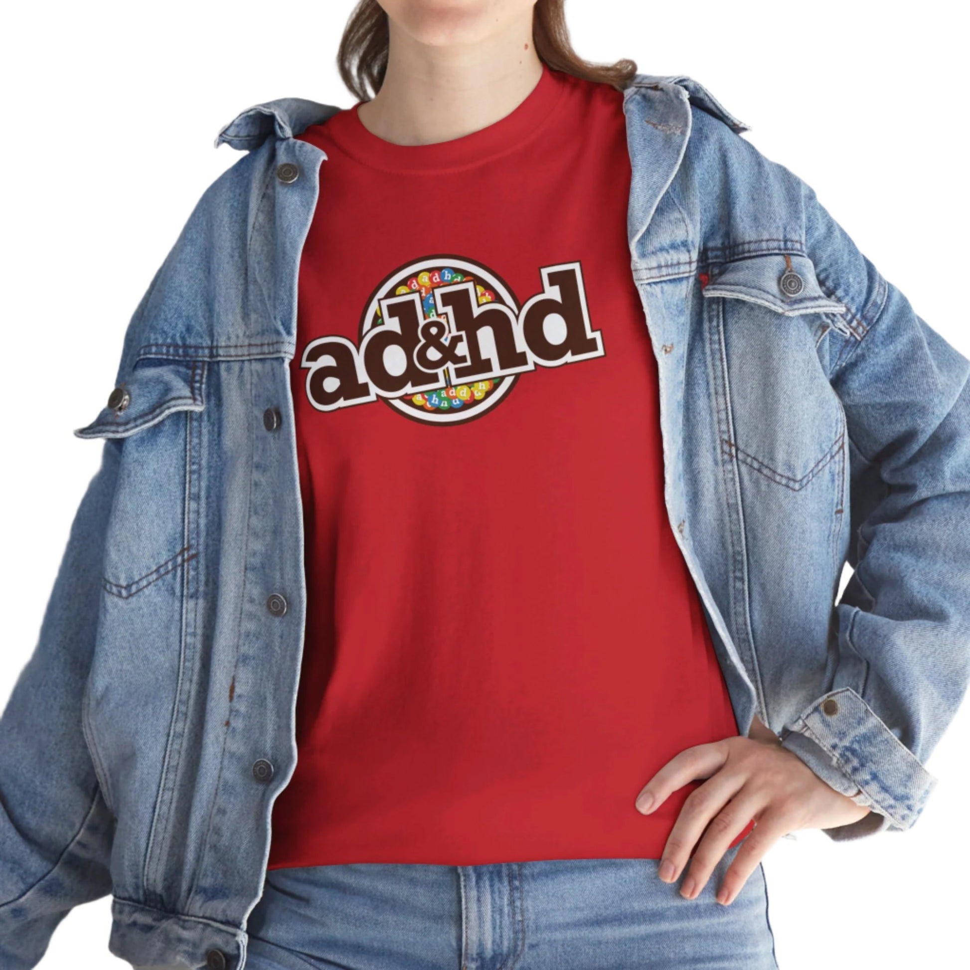 Female wearng Unisex ADHD m&m Brand Parody T-Shirt in White with Denim Jacket. Part of the Vivid Divergence Range. Everyday Products That Celebrate Your Neurospicy.