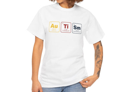 Woman with curly hair wearing a white "Au Ti Sm" periodic table Autism T-shirt, smiling and posing casually. Part of the Vivid Divergence Sensory Friendly Unisex Tees Range.